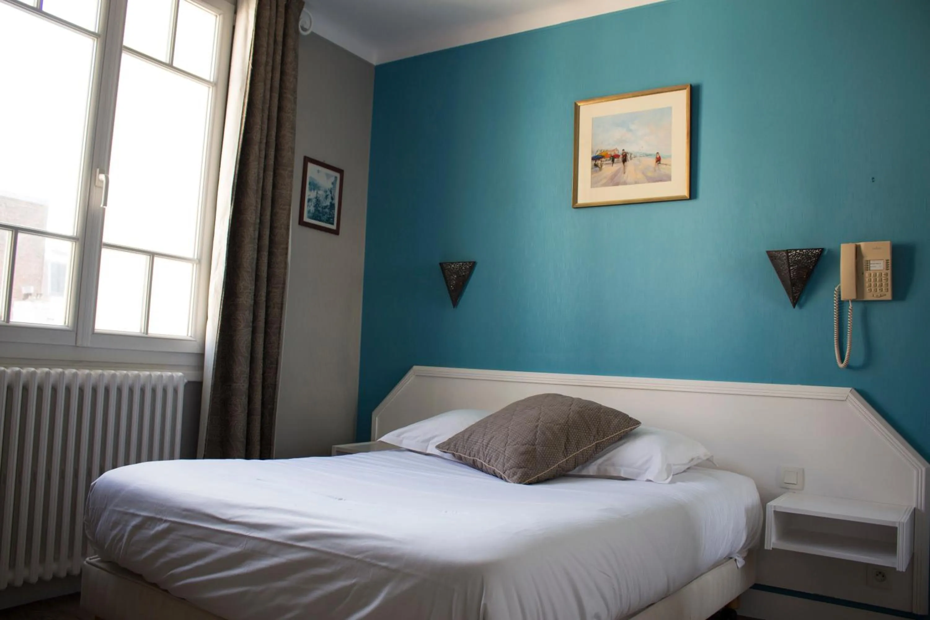 Bed in Hotel Le Reynita