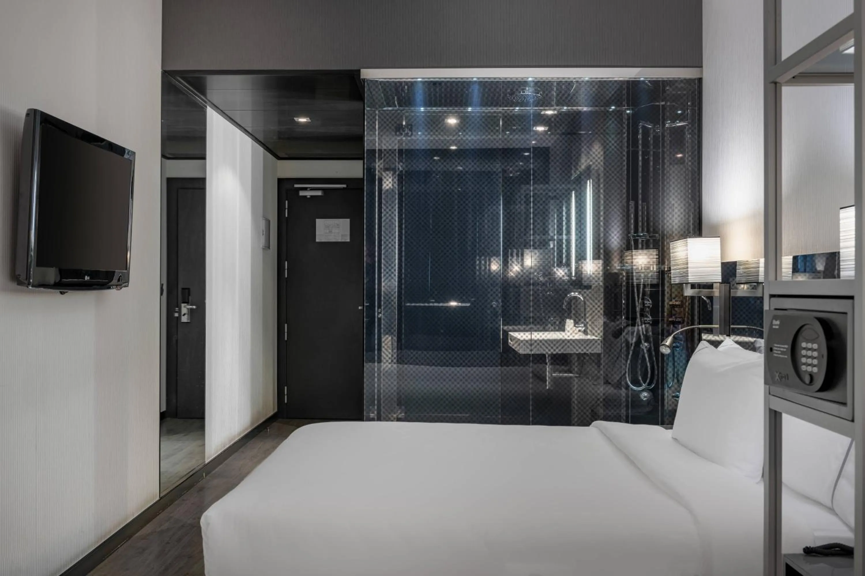 Photo of the whole room, Bed in AC Hotel Atocha by Marriott