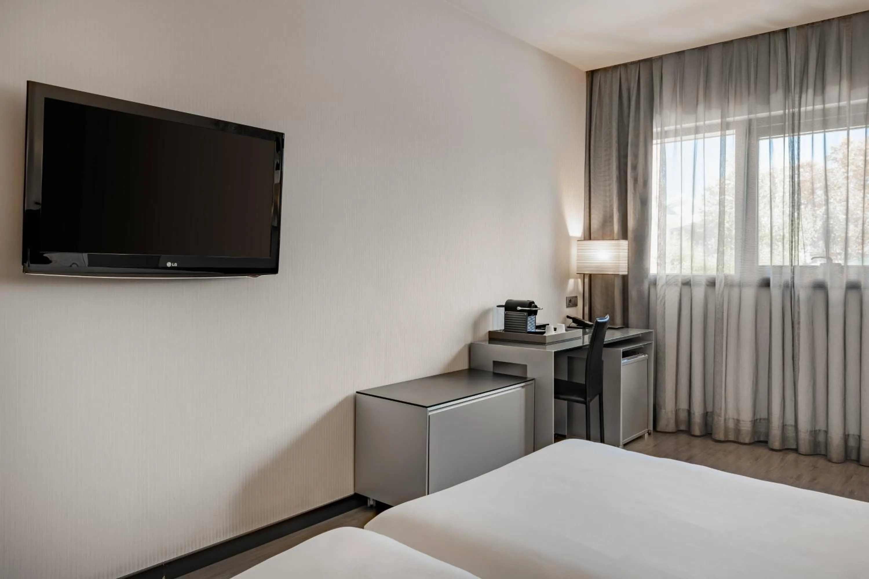 Photo of the whole room, Bed in AC Hotel Atocha by Marriott