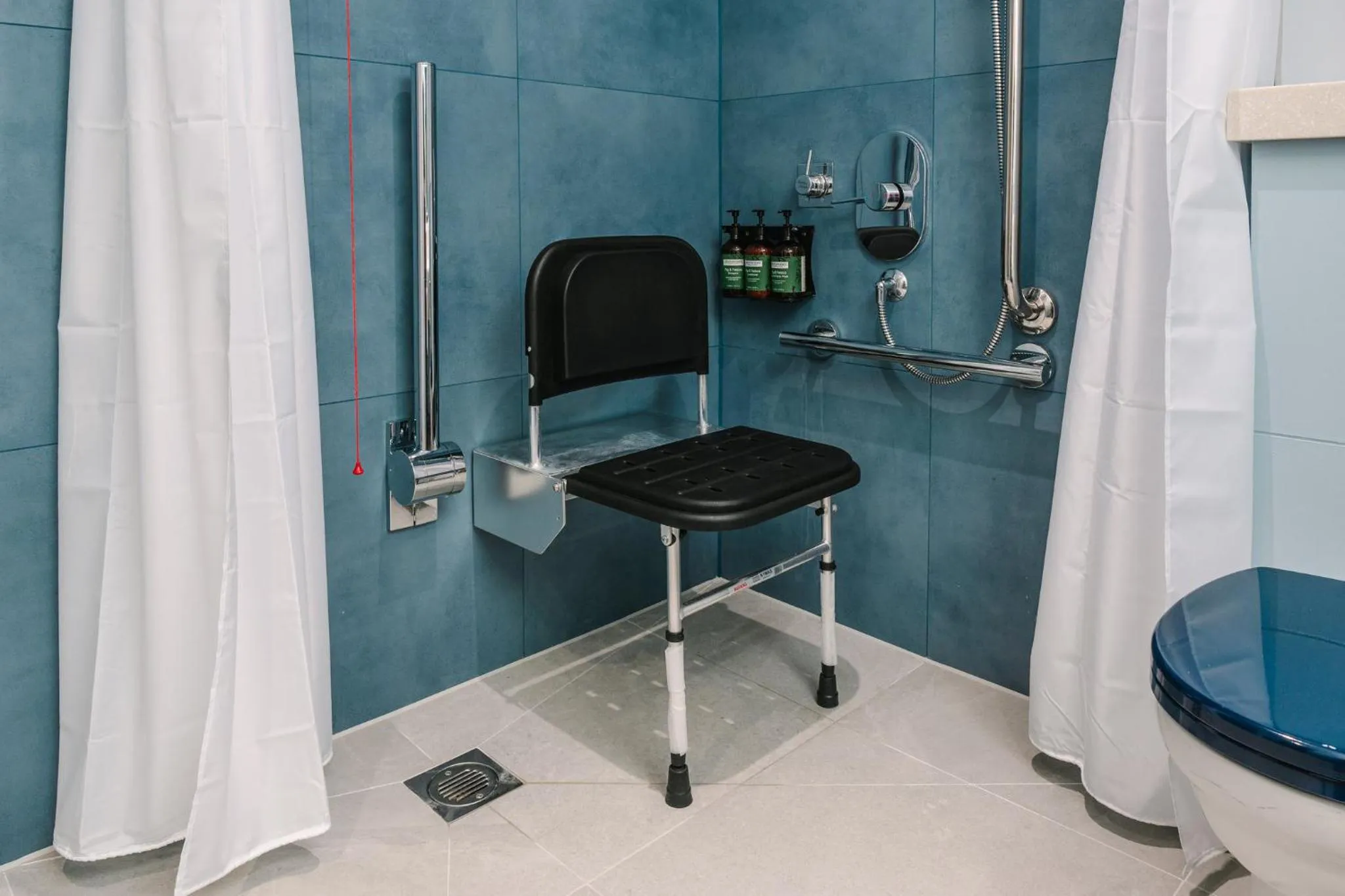 Bathroom in voco Winchester Hotel & Spa by IHG