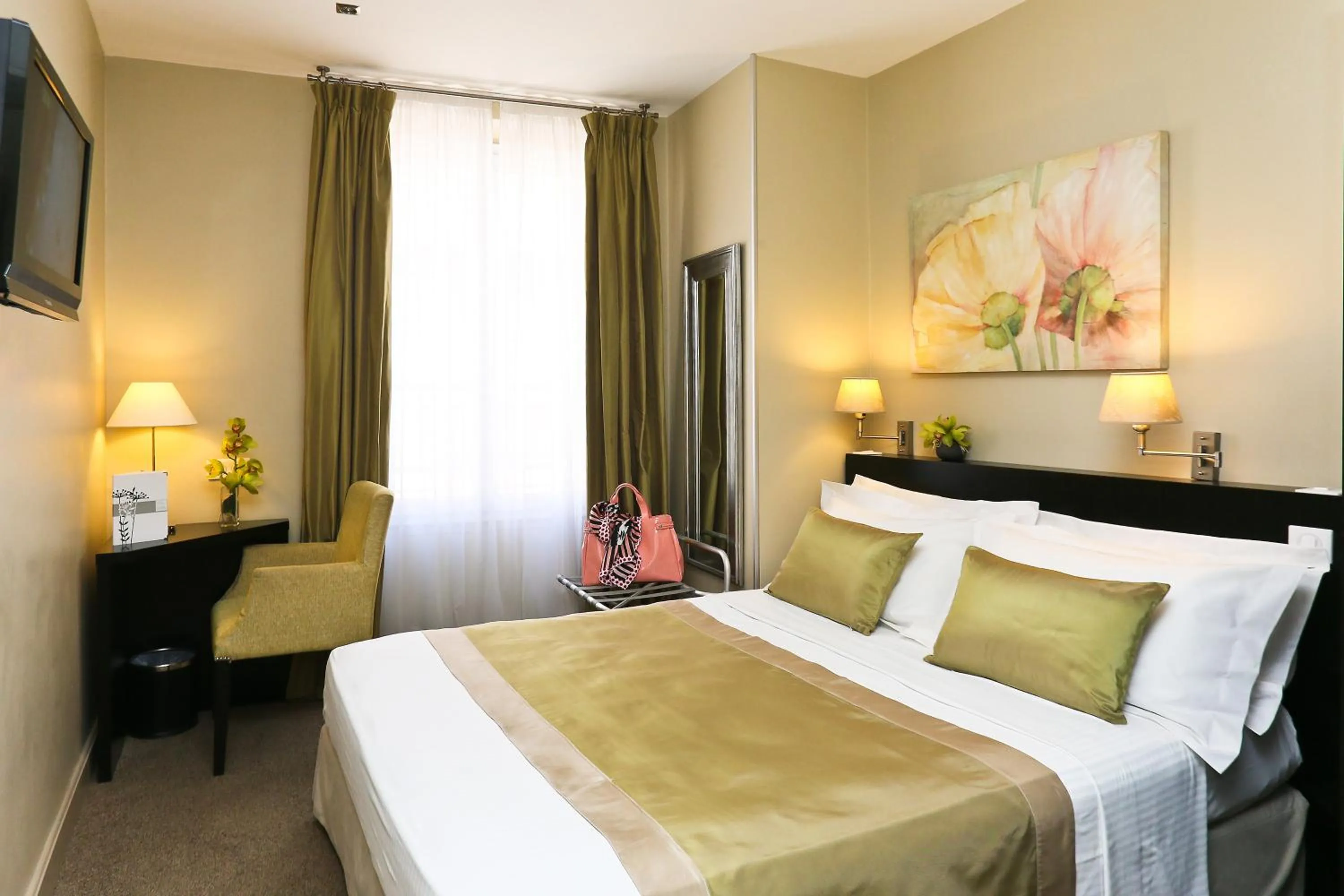 Bed in La Place Boutique Hotel