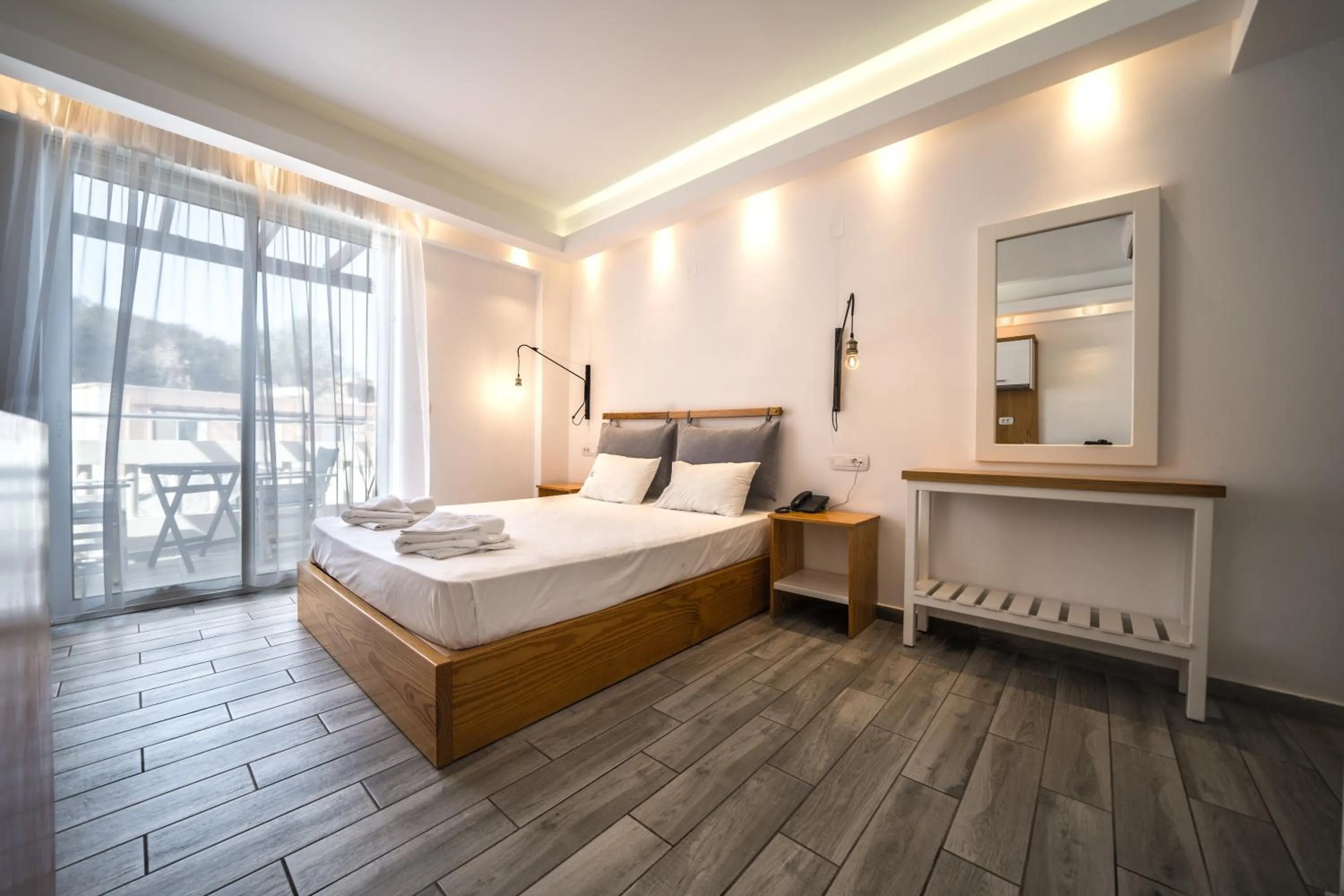 Bed in Porto Kalamaki Hotel