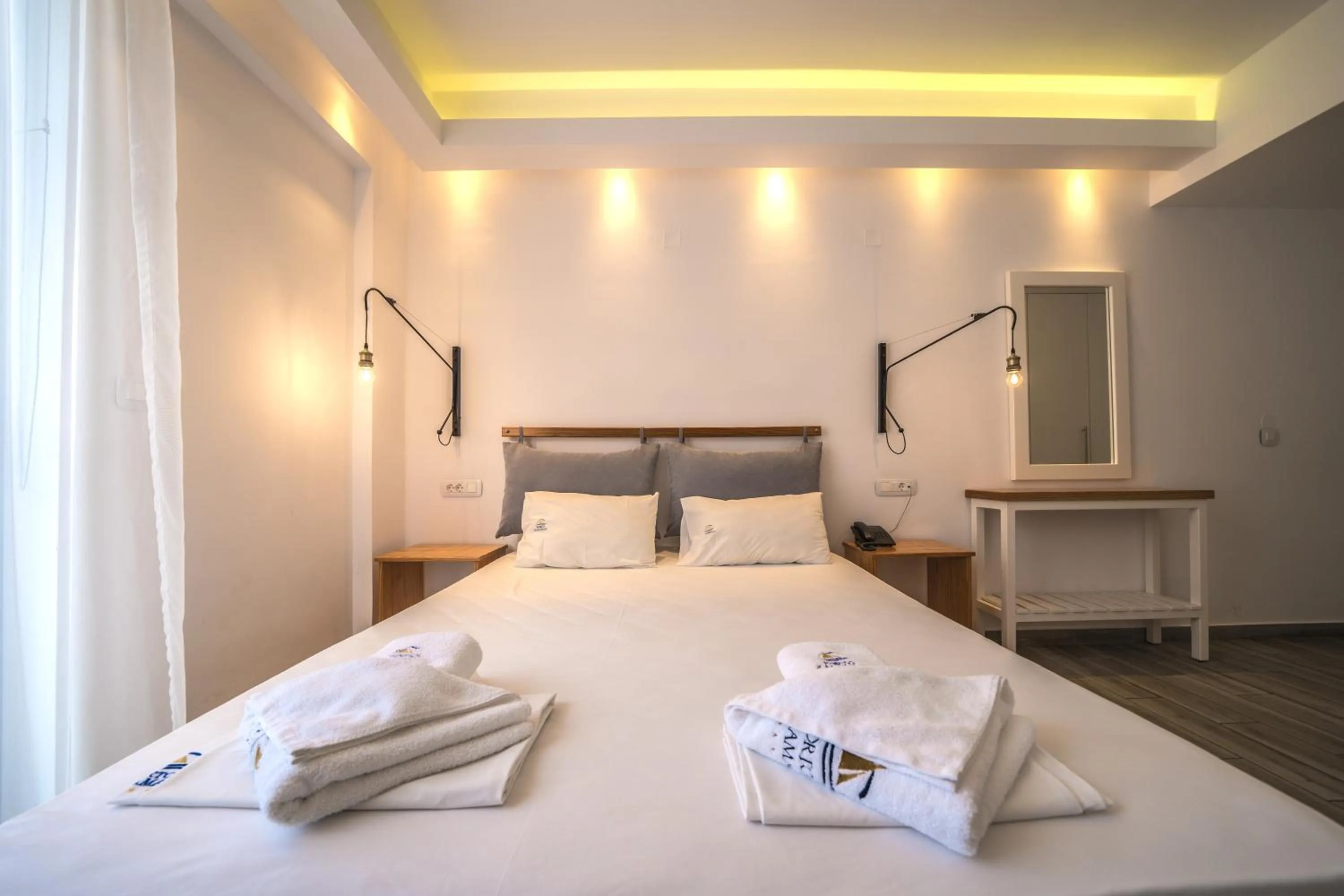 Bed in Porto Kalamaki Hotel