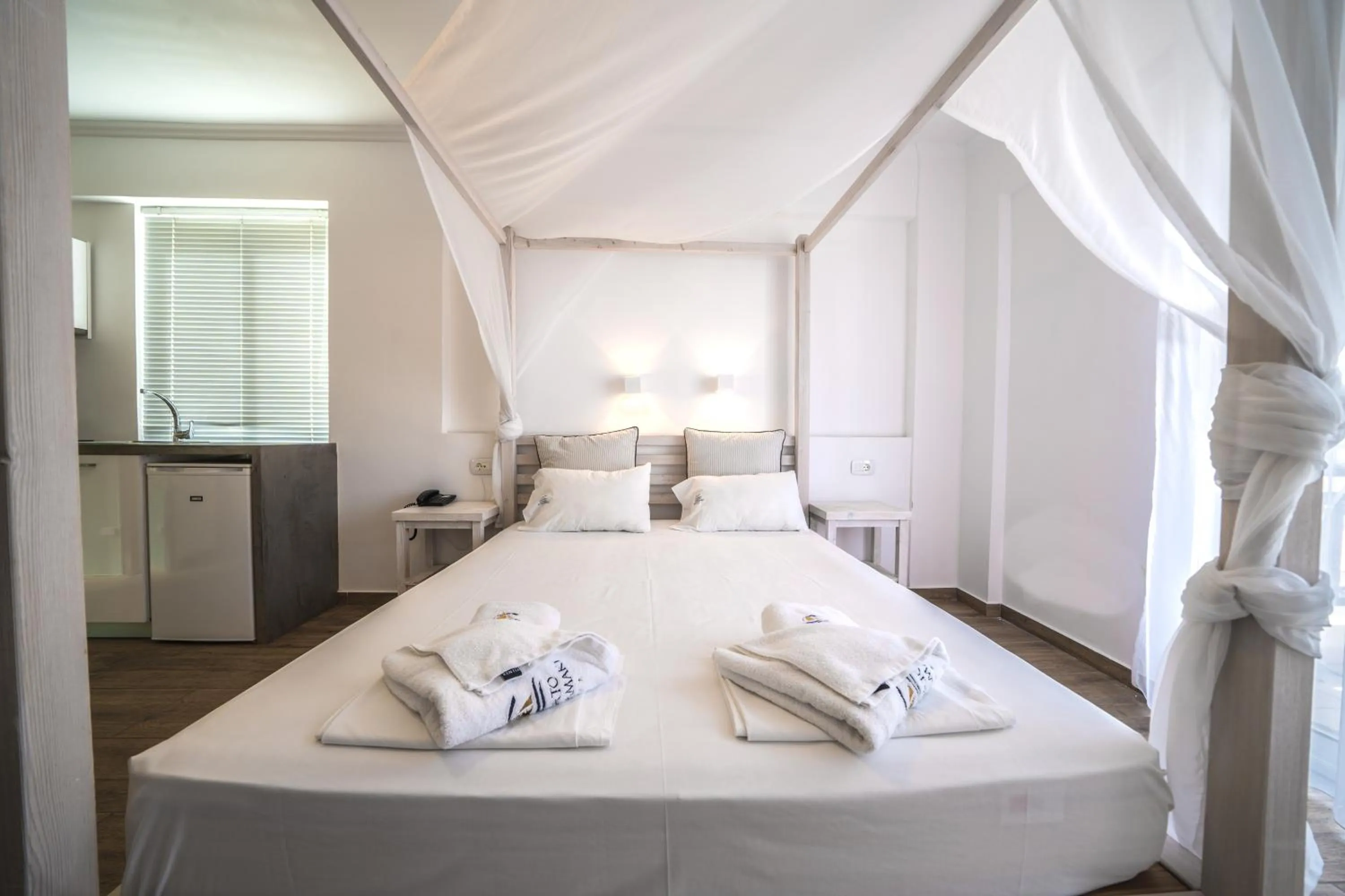 Bed in Porto Kalamaki Hotel