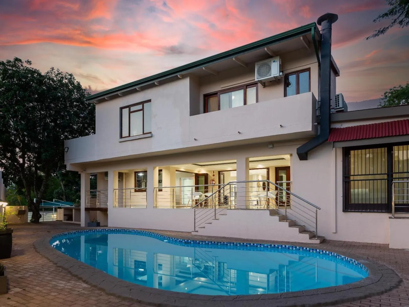 Swimming pool in Global Village Guest House