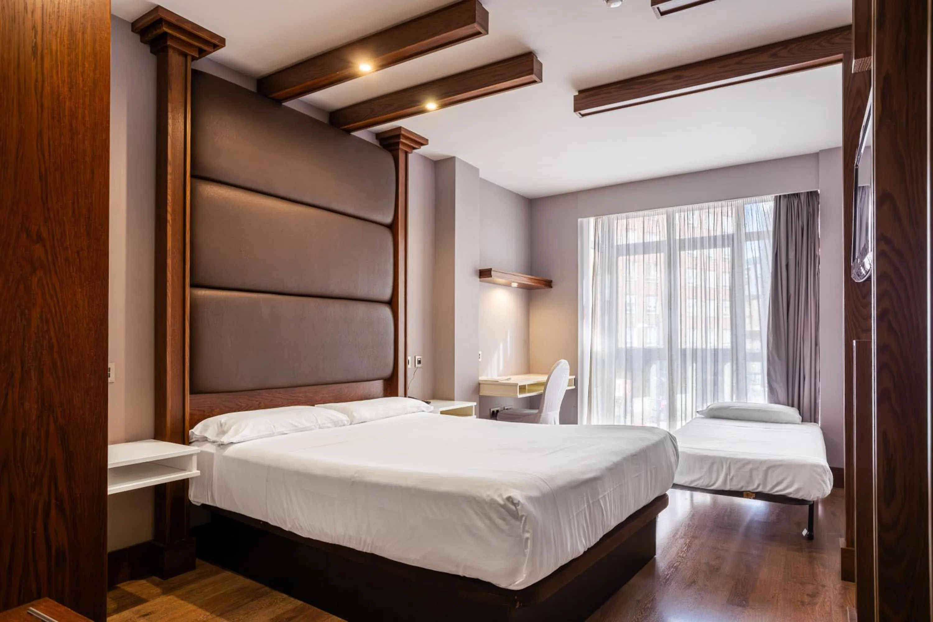 Bed in Hotel Centro Los Braseros