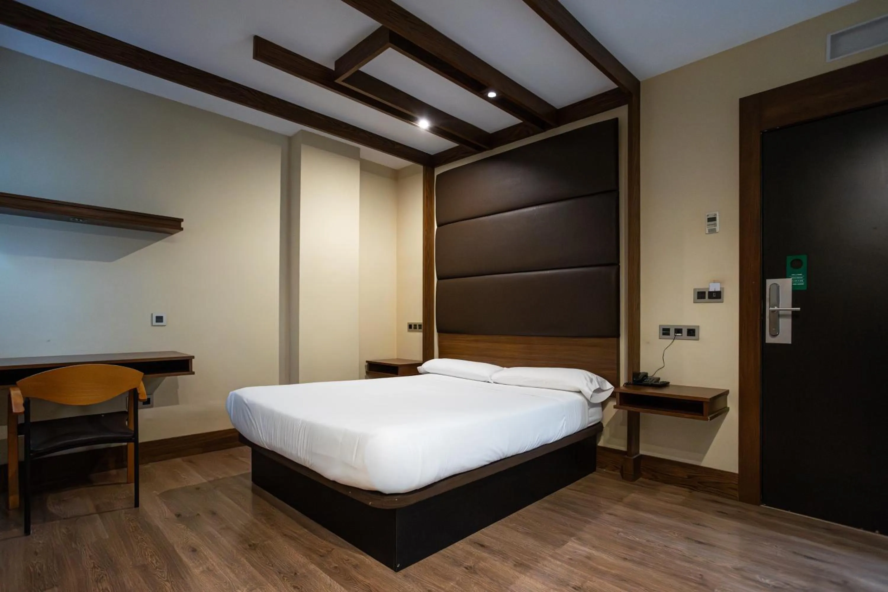 Bed in Hotel Centro Los Braseros