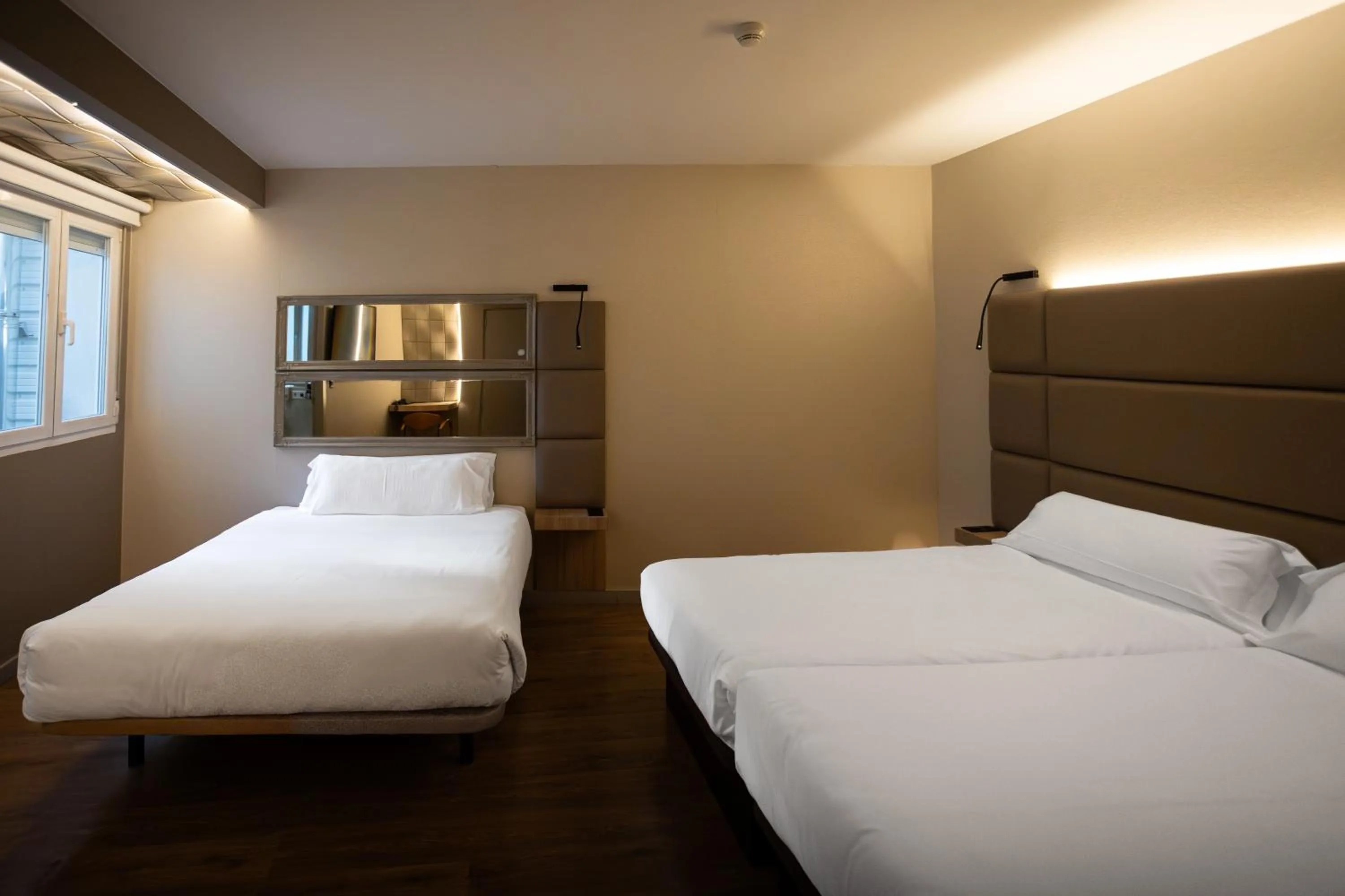 Bed in Hotel Centro Los Braseros