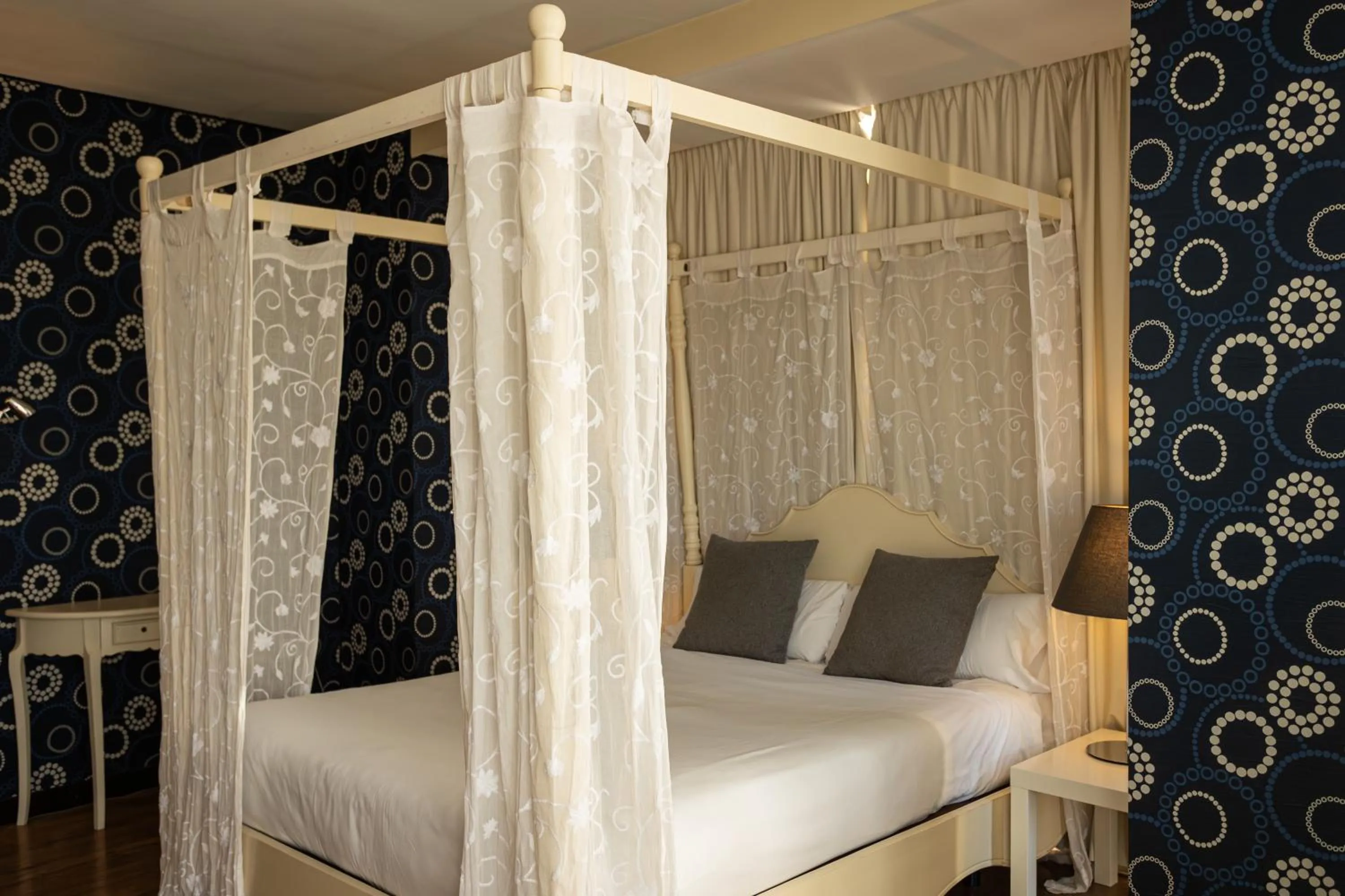 Bed in Hotel Centro Los Braseros