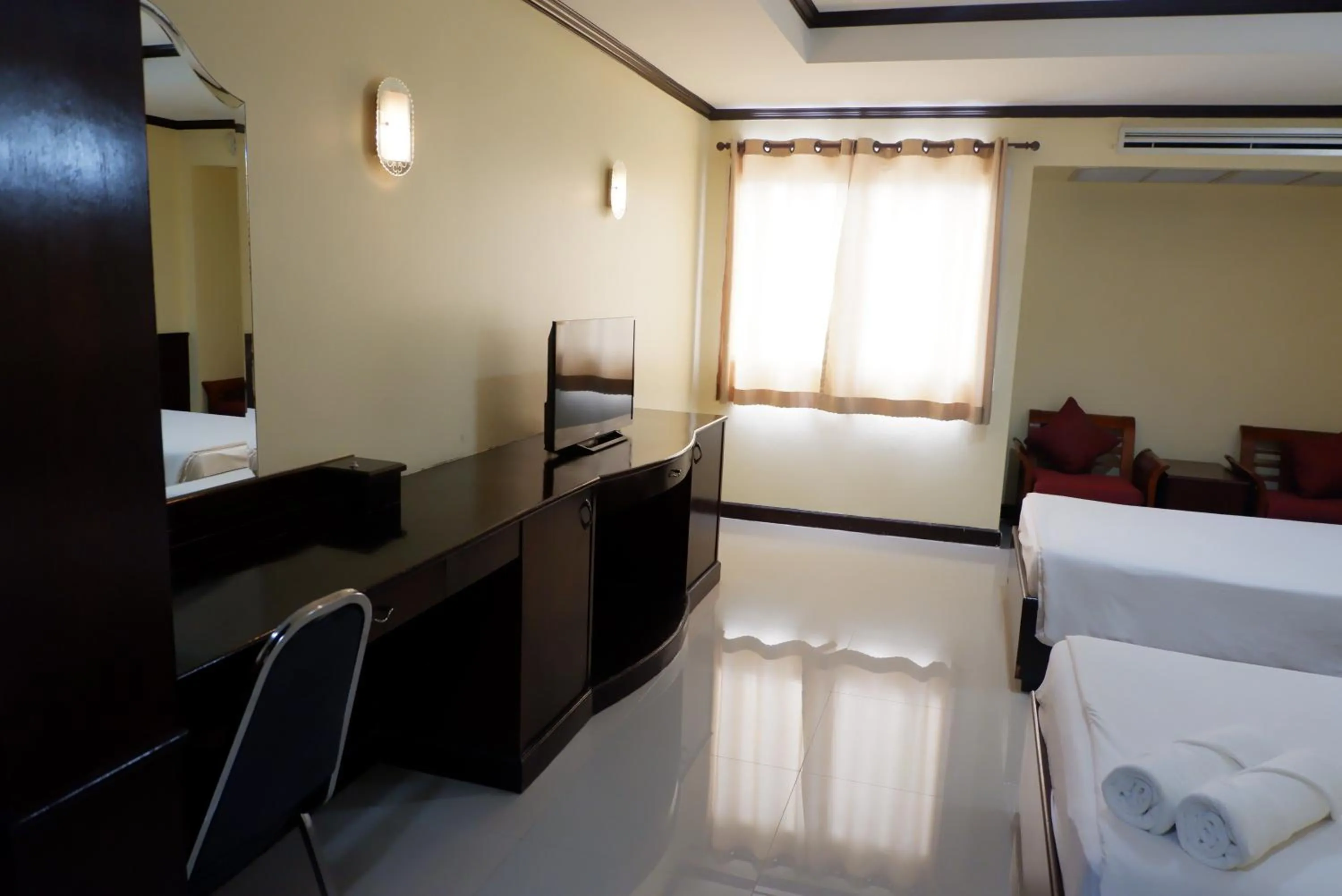 Bed in Auychai Grand Hotel