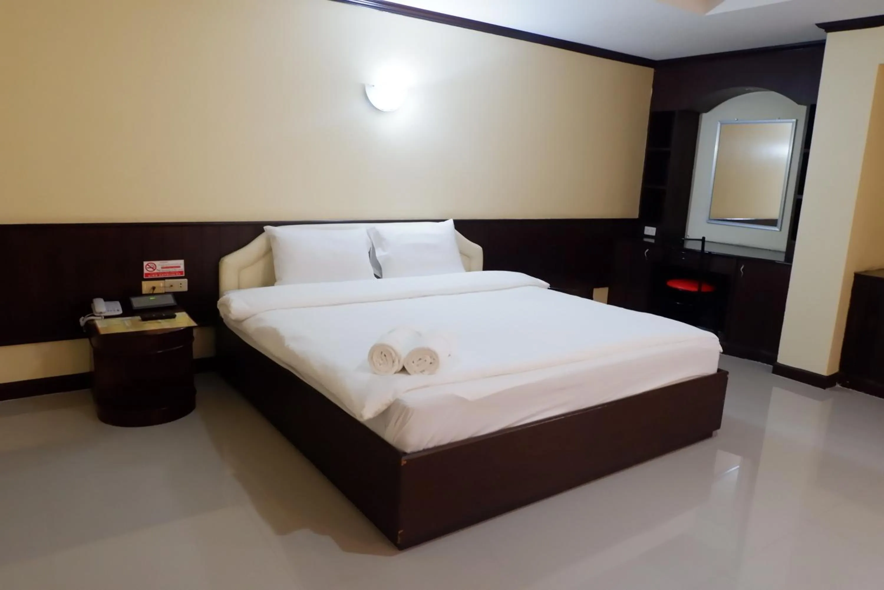 Bed in Auychai Grand Hotel