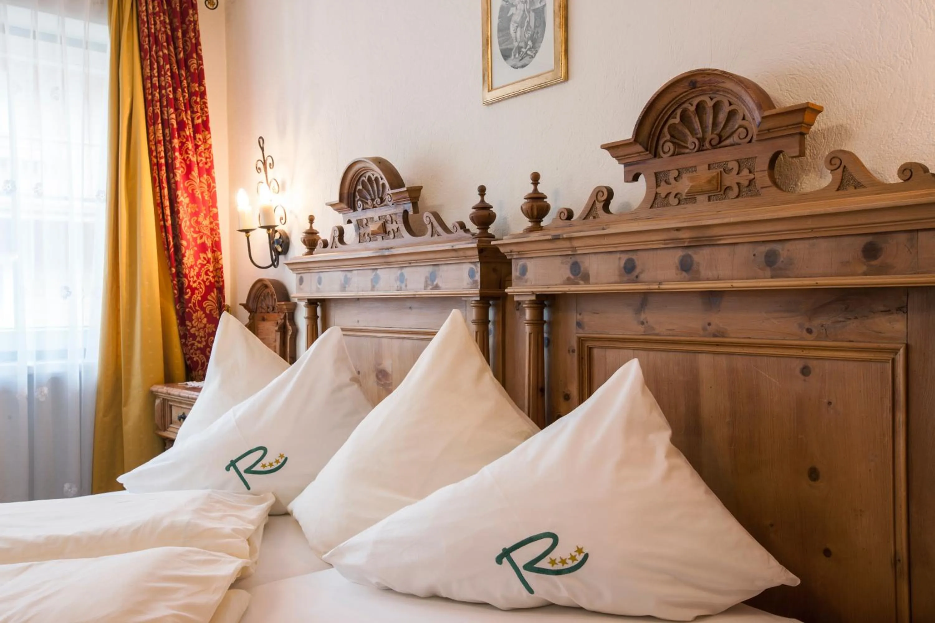 Bed in Sylvana's Wohlfühl Hotel