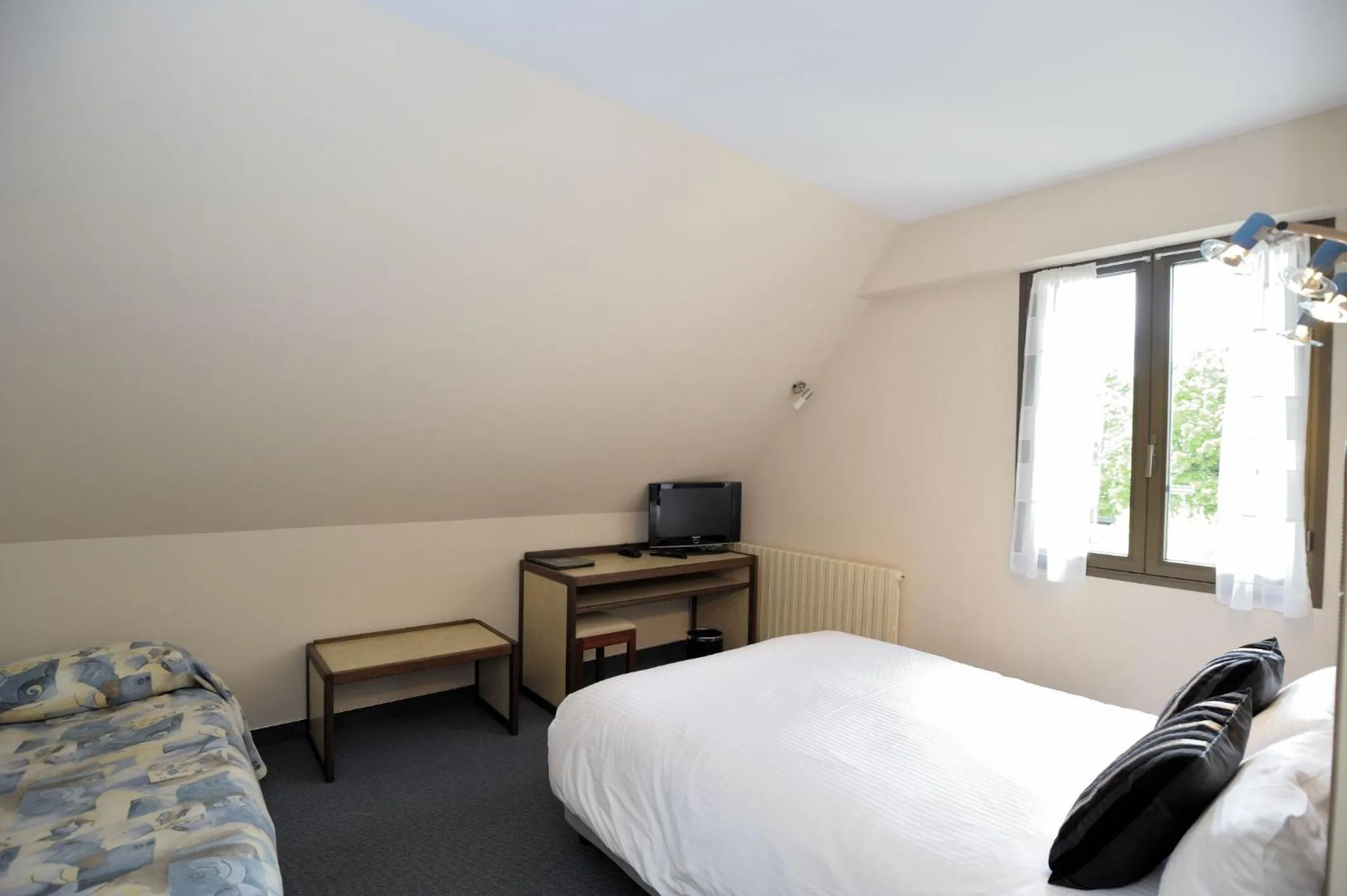 Photo of the whole room in Hôtel Logis Le Relais De La Poste