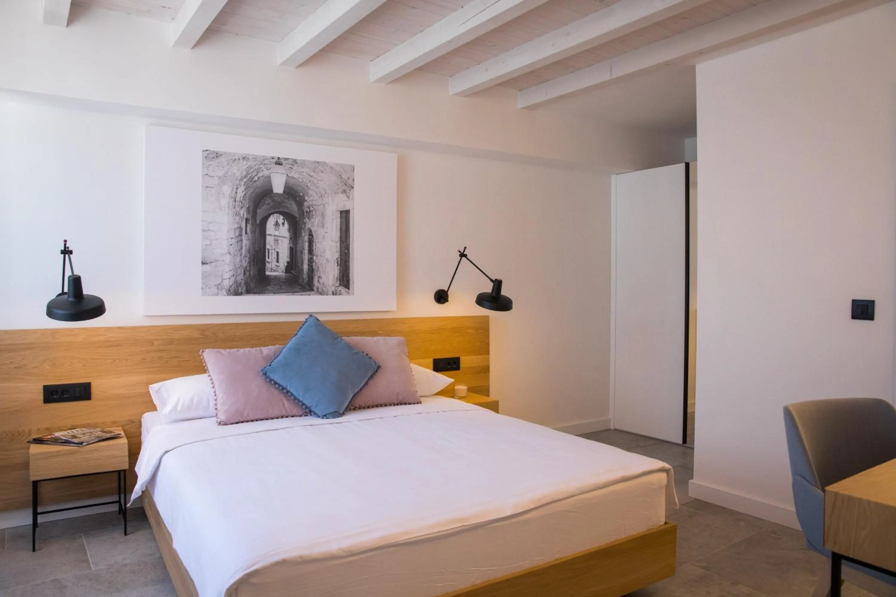 Bed in Bova Luxury Rooms