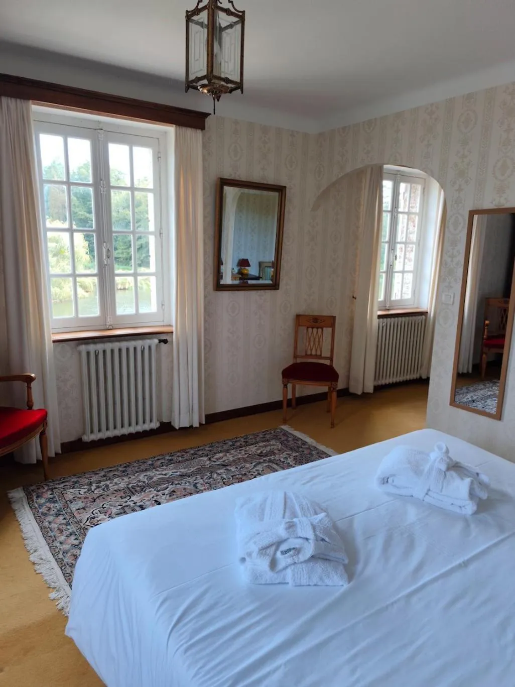 Photo of the whole room, Bed in Manoir Du Stang