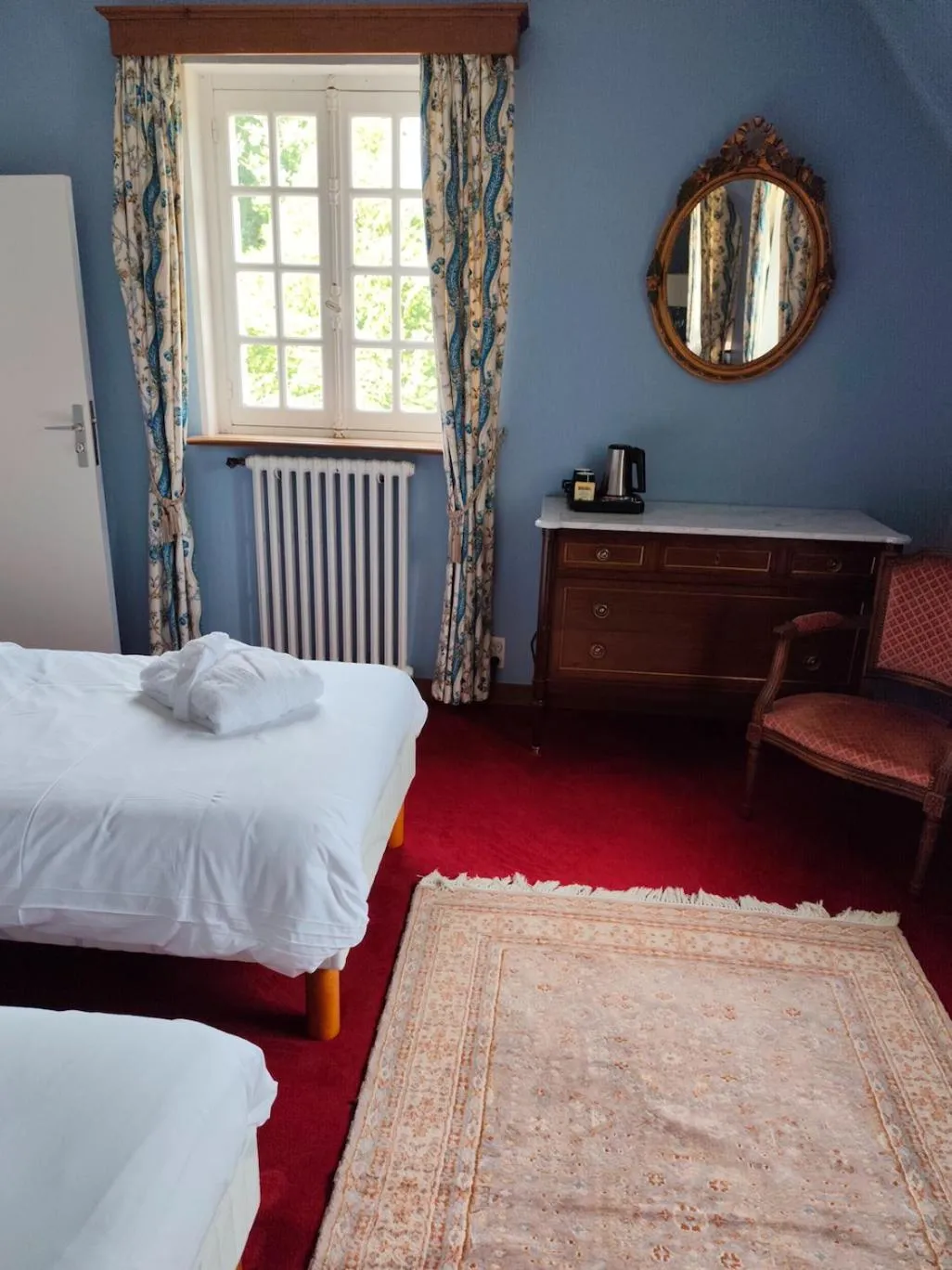 Photo of the whole room, Bed in Manoir Du Stang