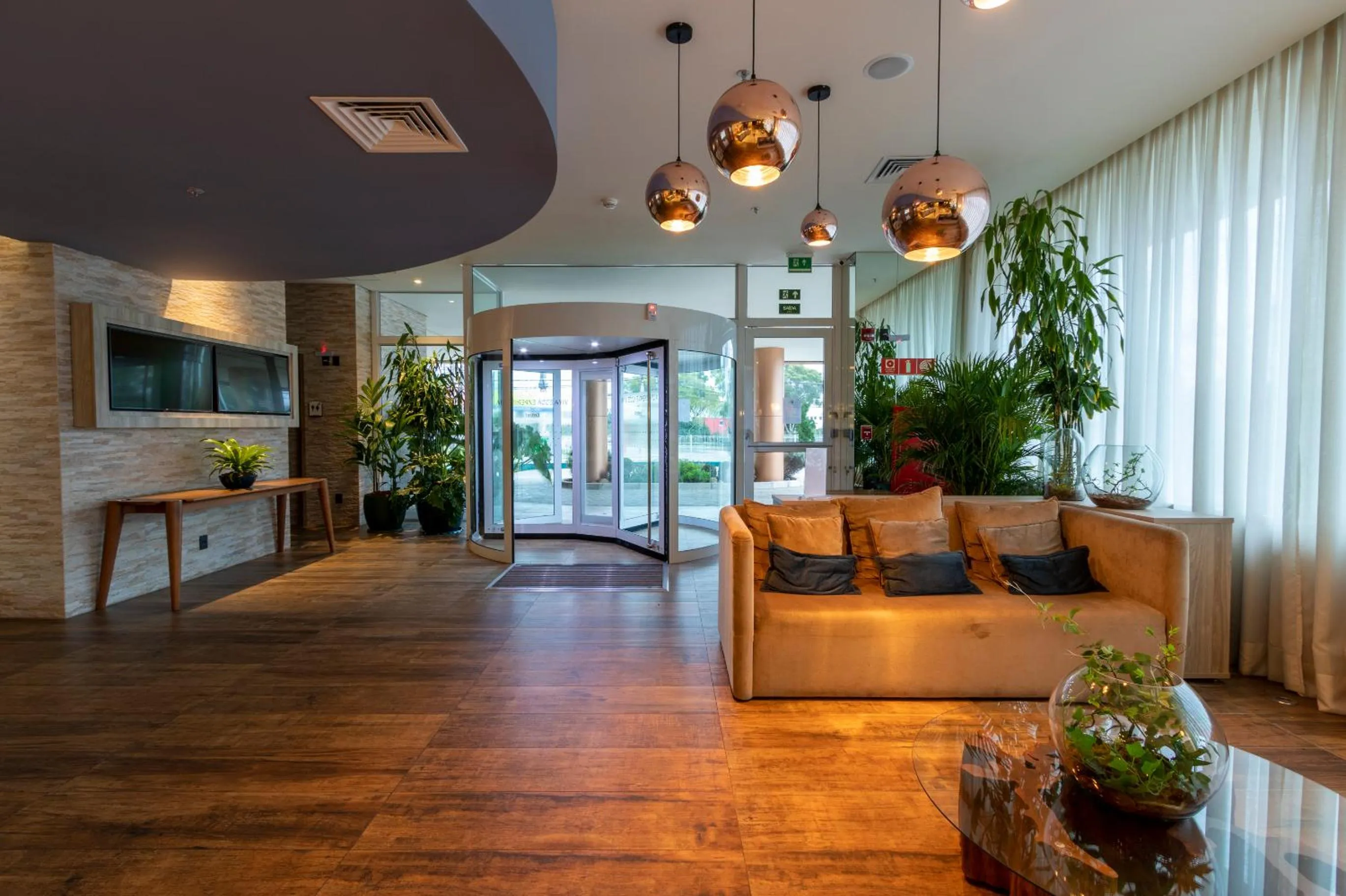 Lobby or reception in ibis Styles Curitiba Aeroporto