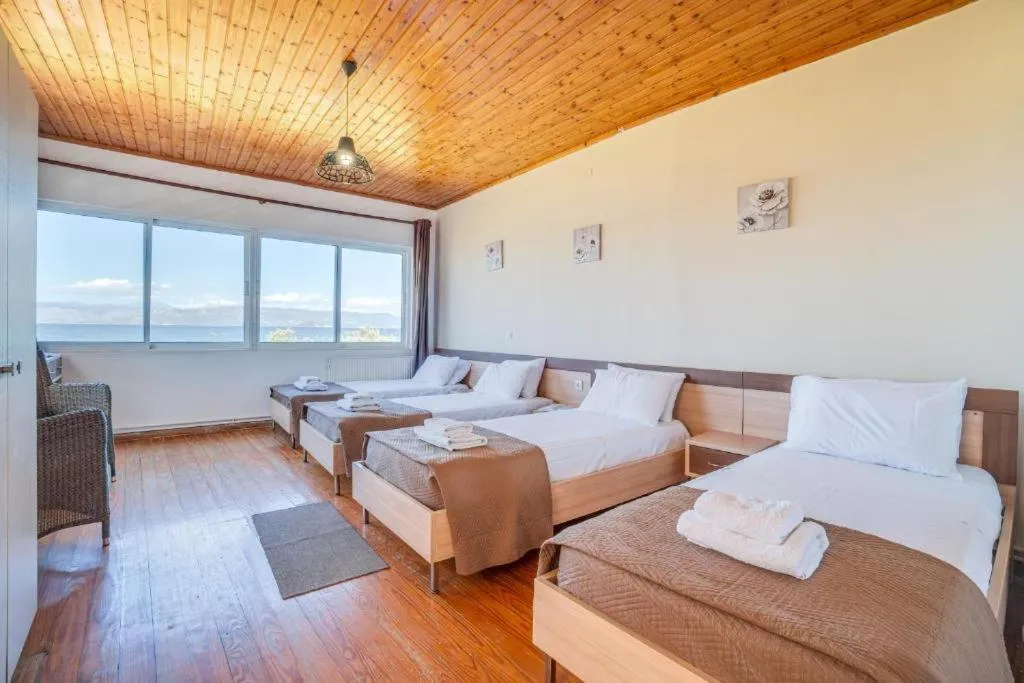 Bed in Sandy Beach Complex - Poolside Studios & Seaside Apartments