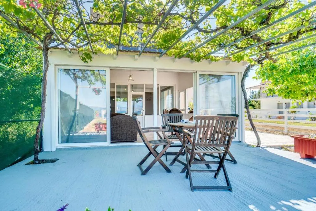 Patio in Sandy Beach Complex - Poolside Studios & Seaside Apartments