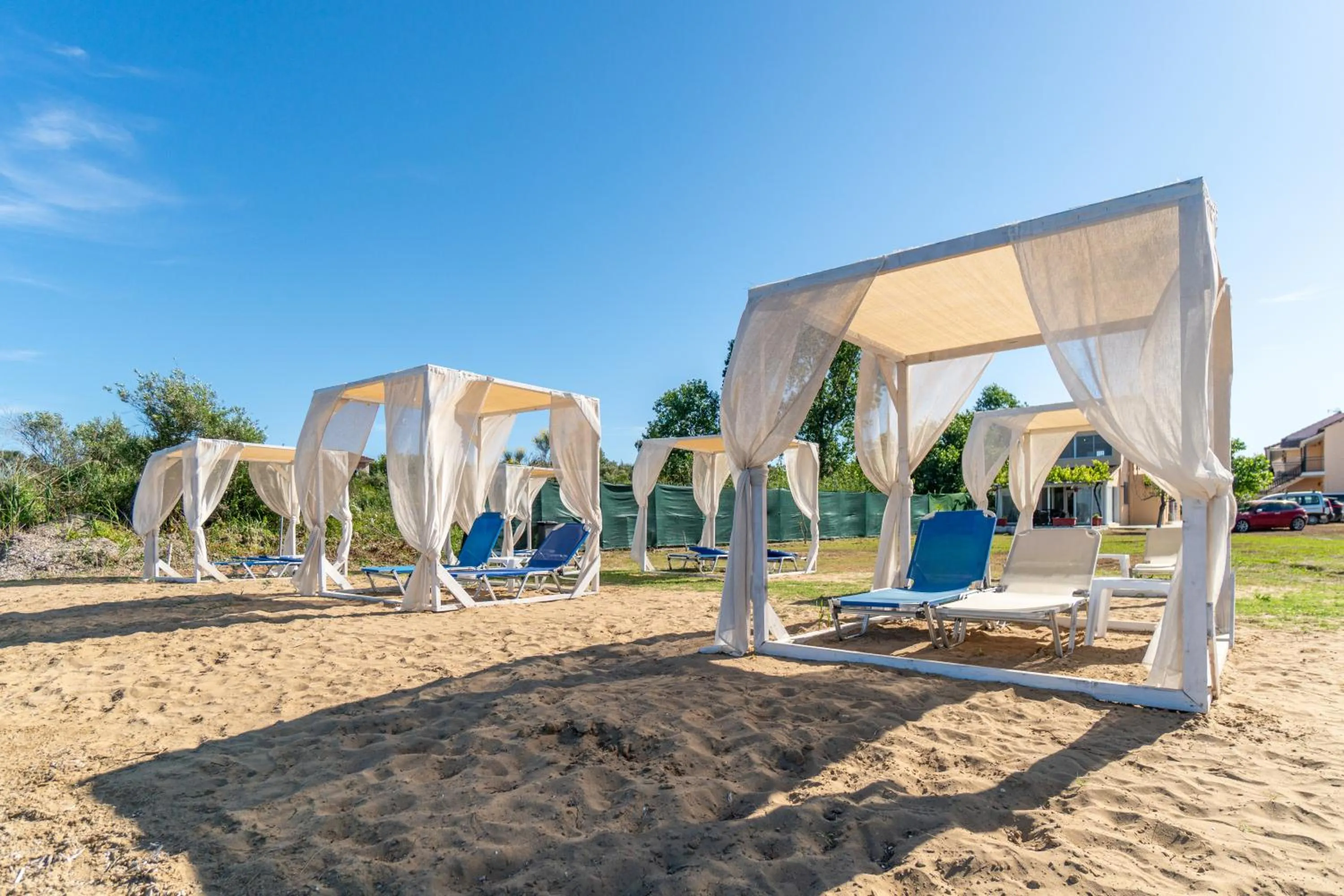 Day in Sandy Beach Complex - Poolside Studios & Seaside Apartments