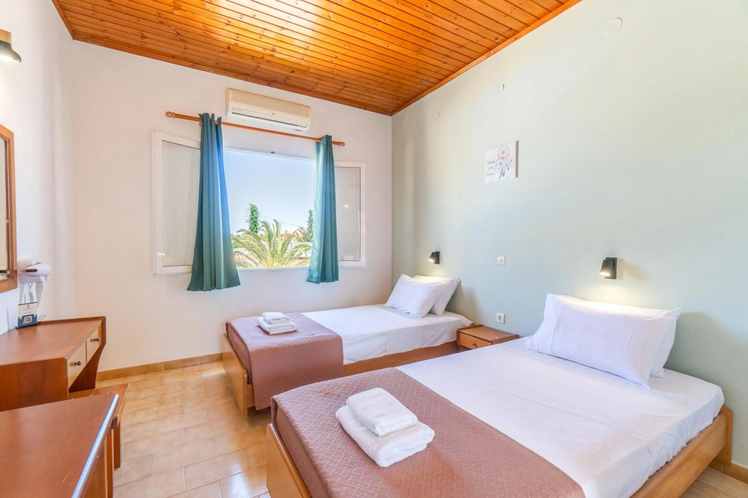 Bed in Sandy Beach Complex - Poolside Studios & Seaside Apartments