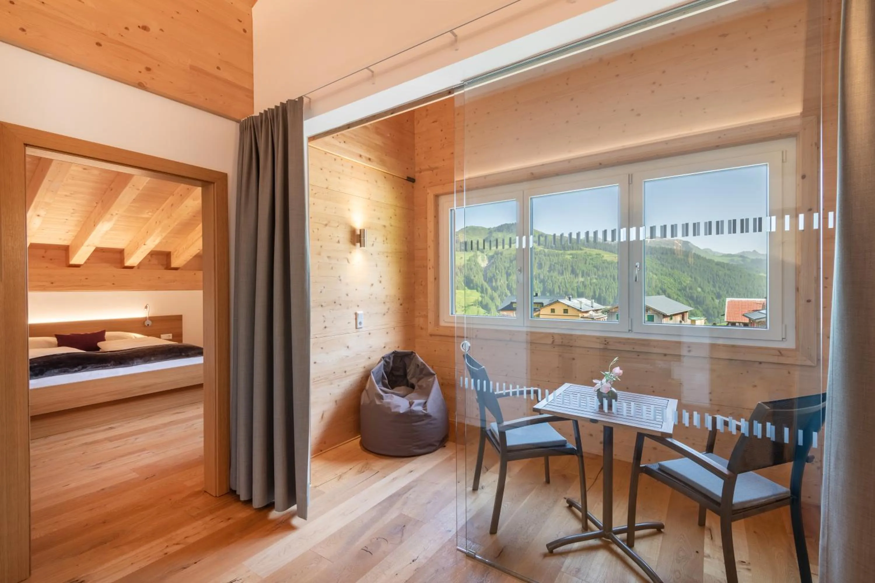 Seating area, Bed in Rössle Appartements und Sport Rössle Skiverleih & Sportgeschäft