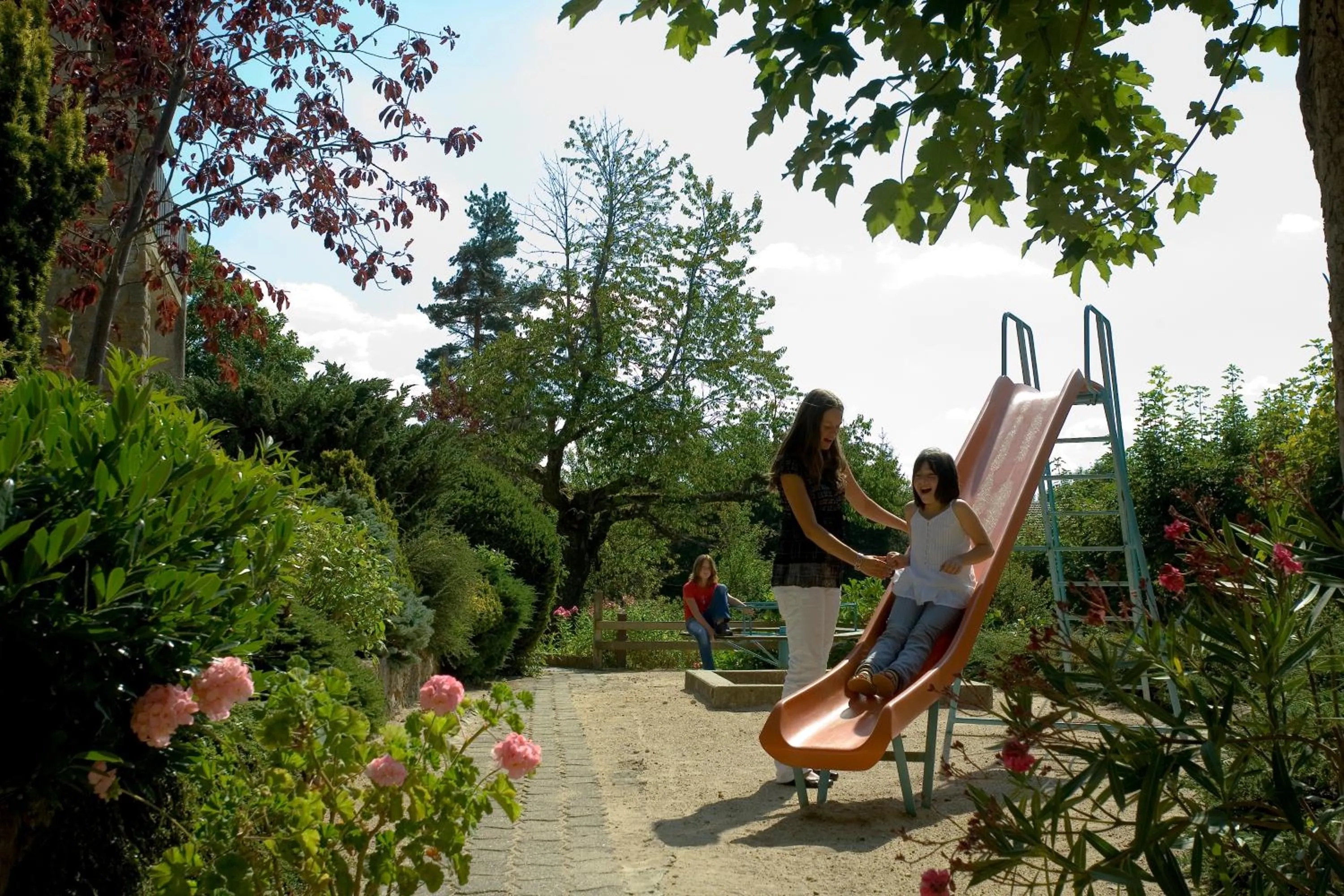 Children play ground in Logis Hôtel Clair Matin