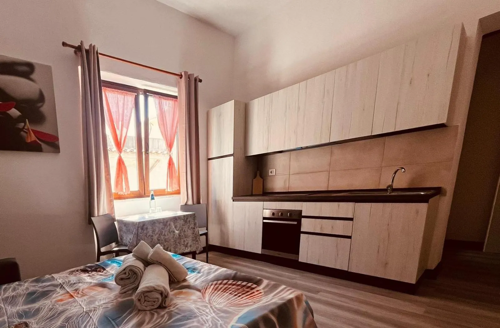 Photo of the whole room, Bed in The square