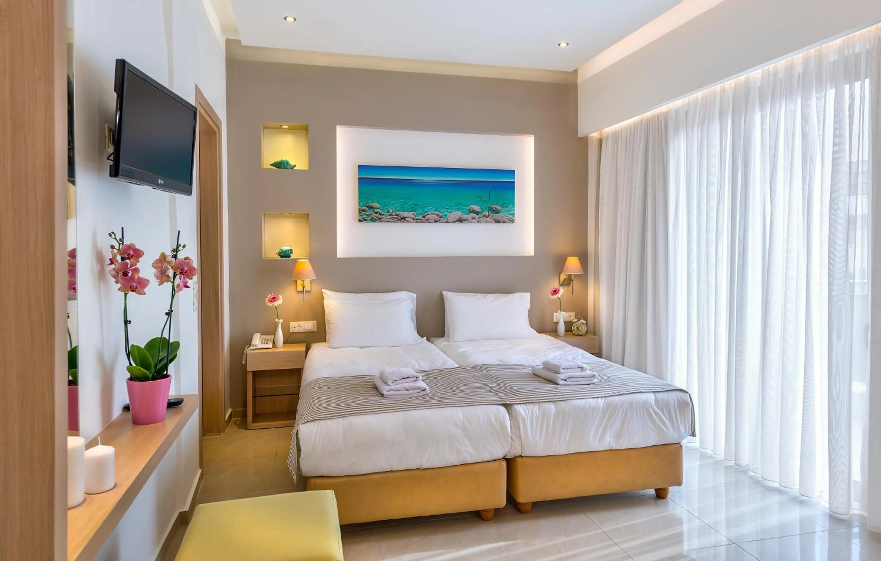 Bed in Leonidas Hotel & Apartments