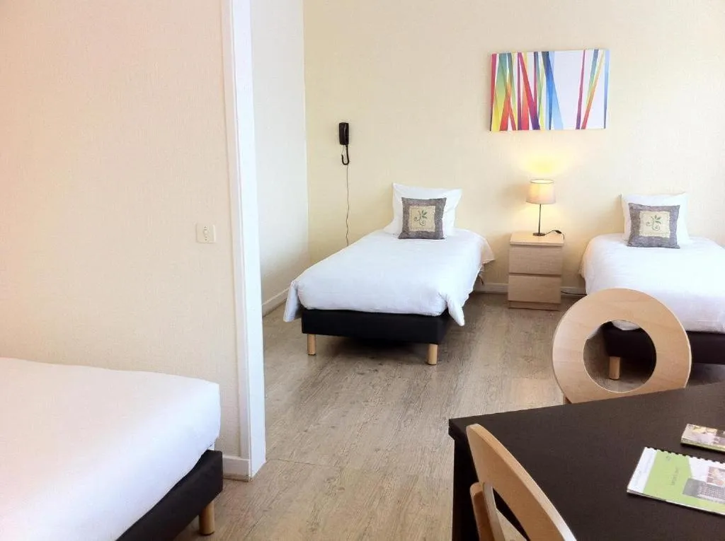 Photo of the whole room, Bed in Brit Hotel Le Parc Vichy