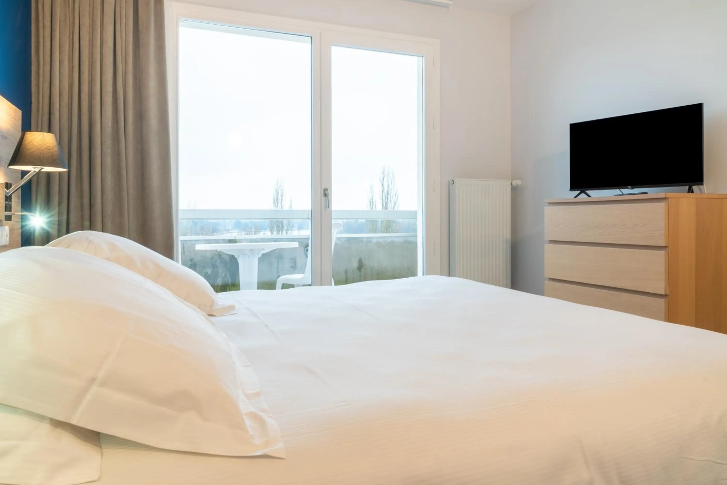 Photo of the whole room, Bed in Brit Hotel Le Parc Vichy