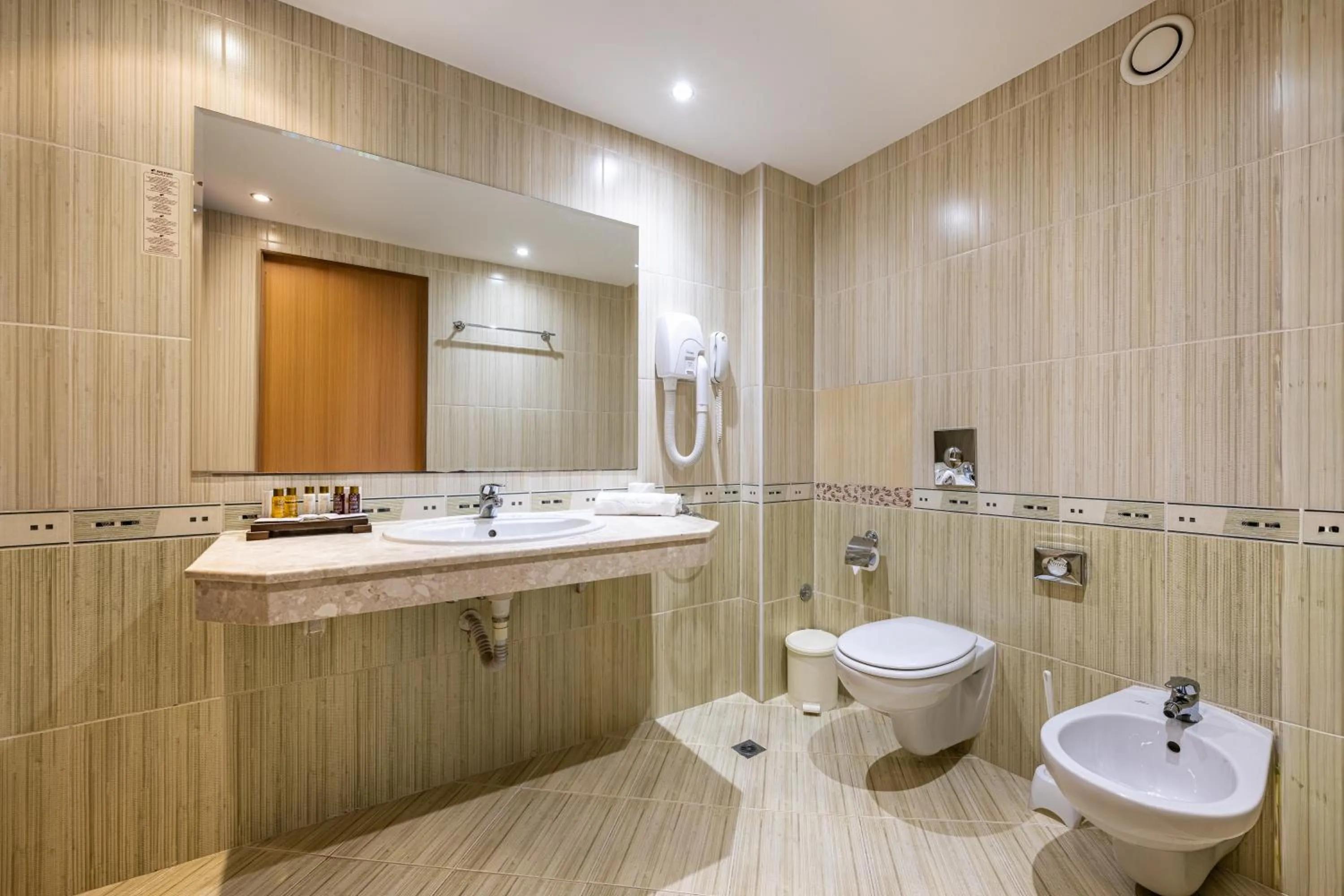 Bathroom in HVD Lotos Hotel - All Inclusive à-la-carte, Private Beach & Free Parking