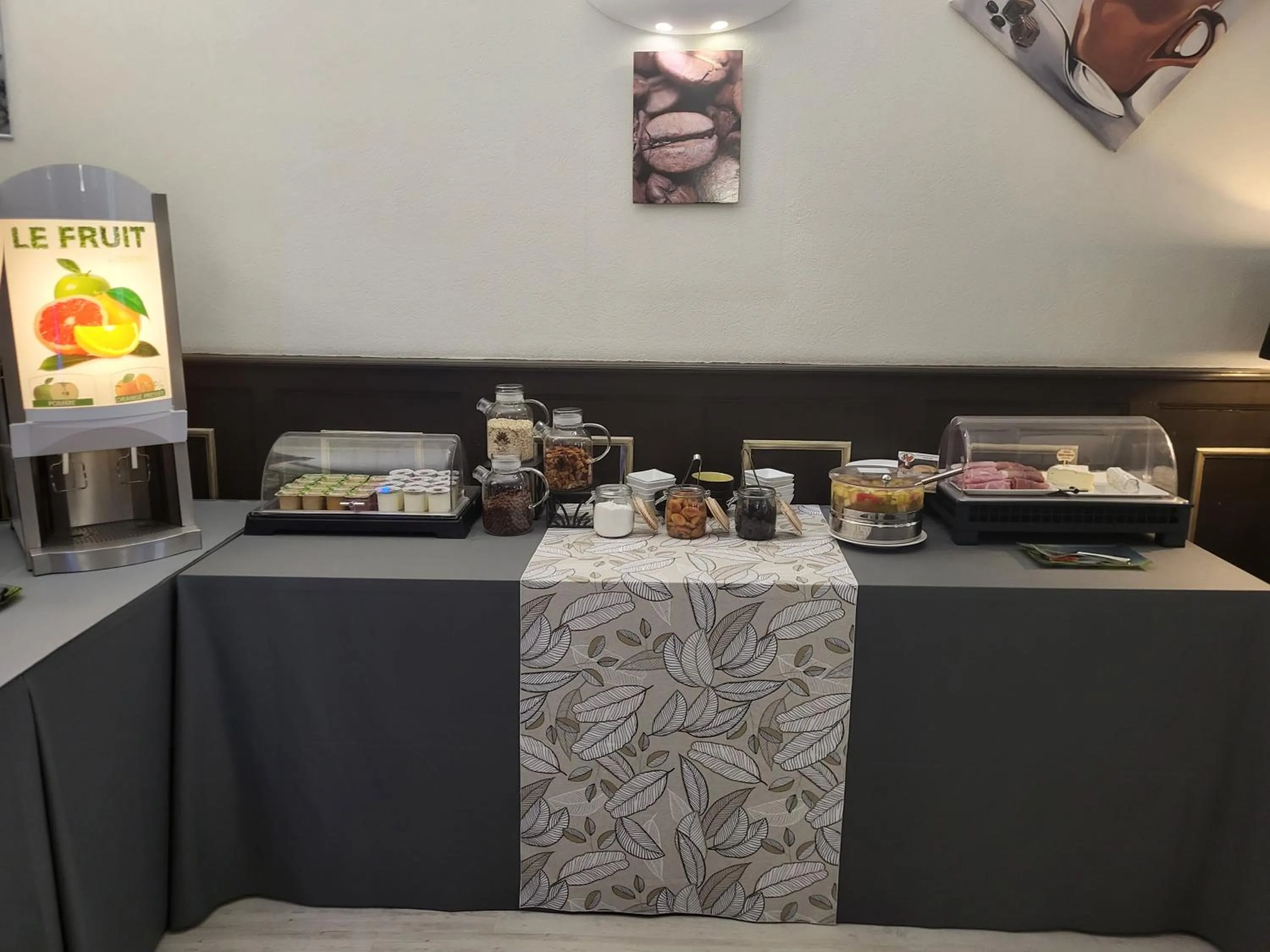 Buffet breakfast in Brit Hotel Confort Auclair