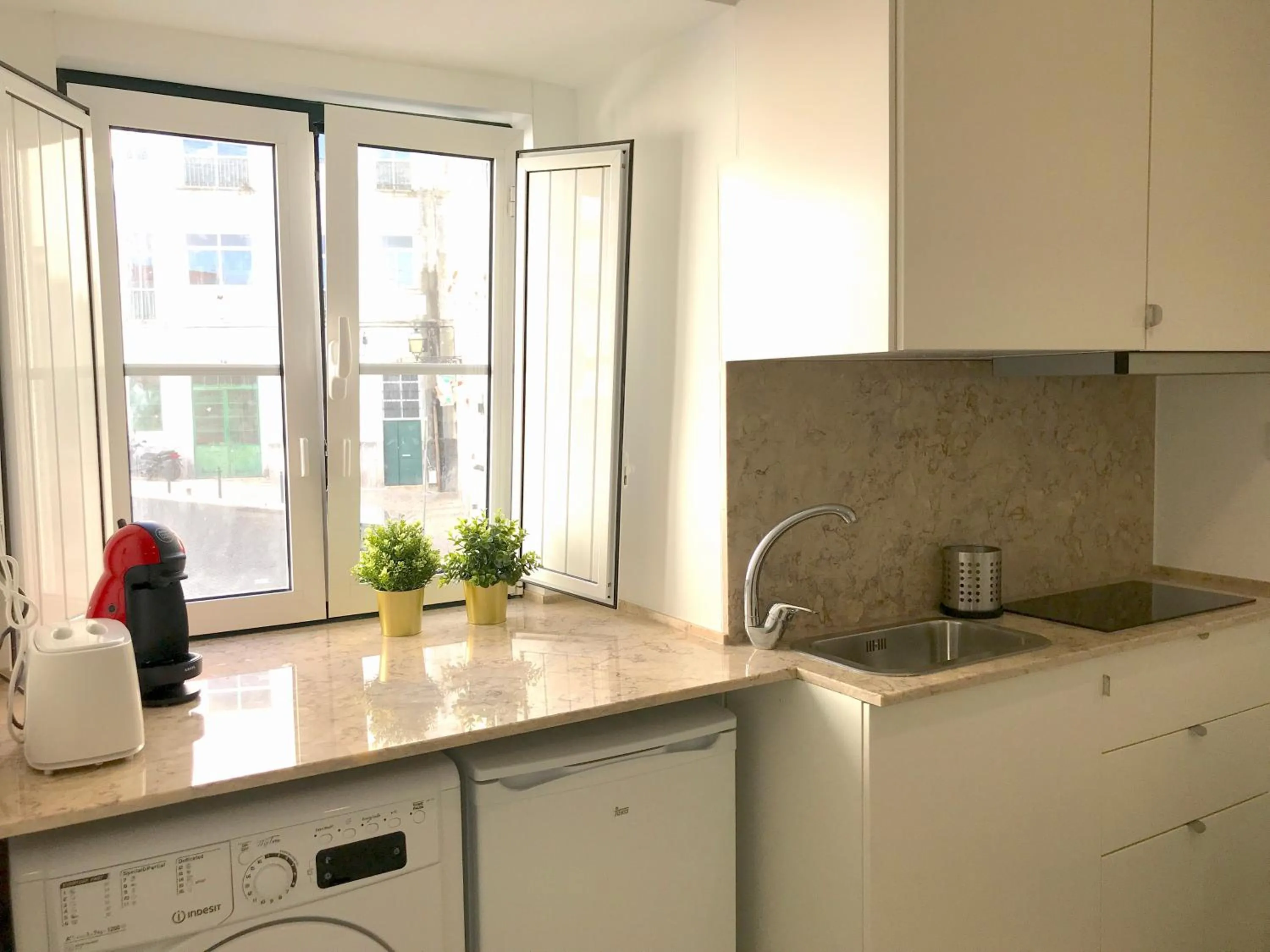 Kitchen or kitchenette in Apartments Center Alfama