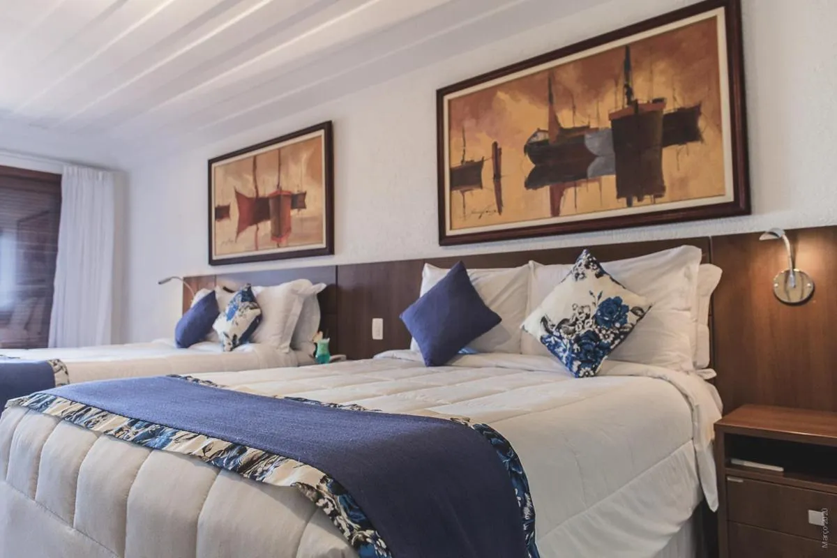 Bed in Hotel Ferradura Resort