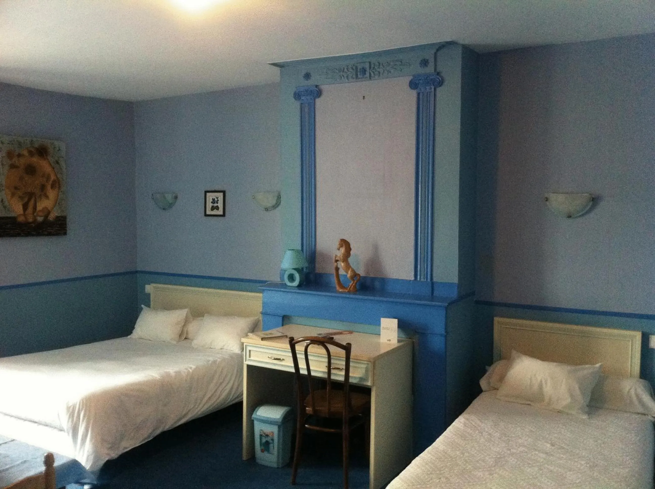 Photo of the whole room, Bed in Logis Hostellerie Du Cheval Blanc