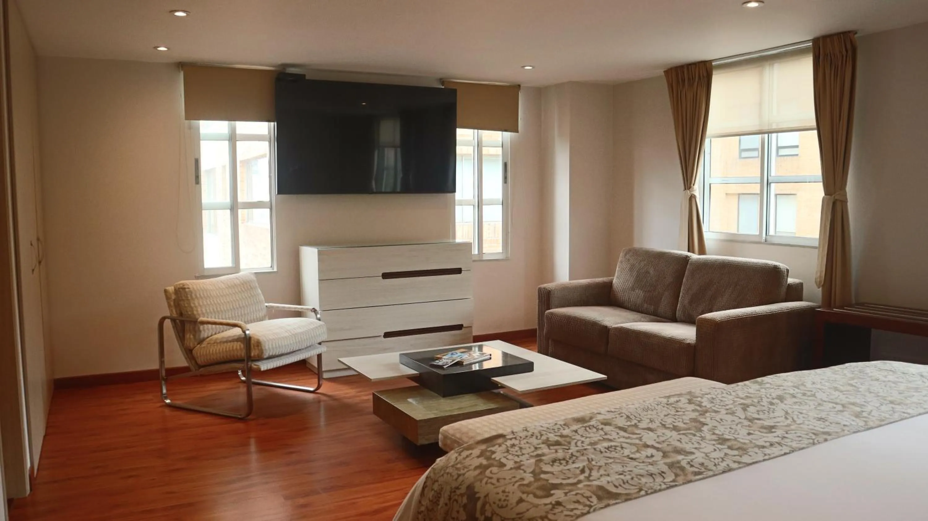 Living room, Bed in Hotel Portón de la Cabrera