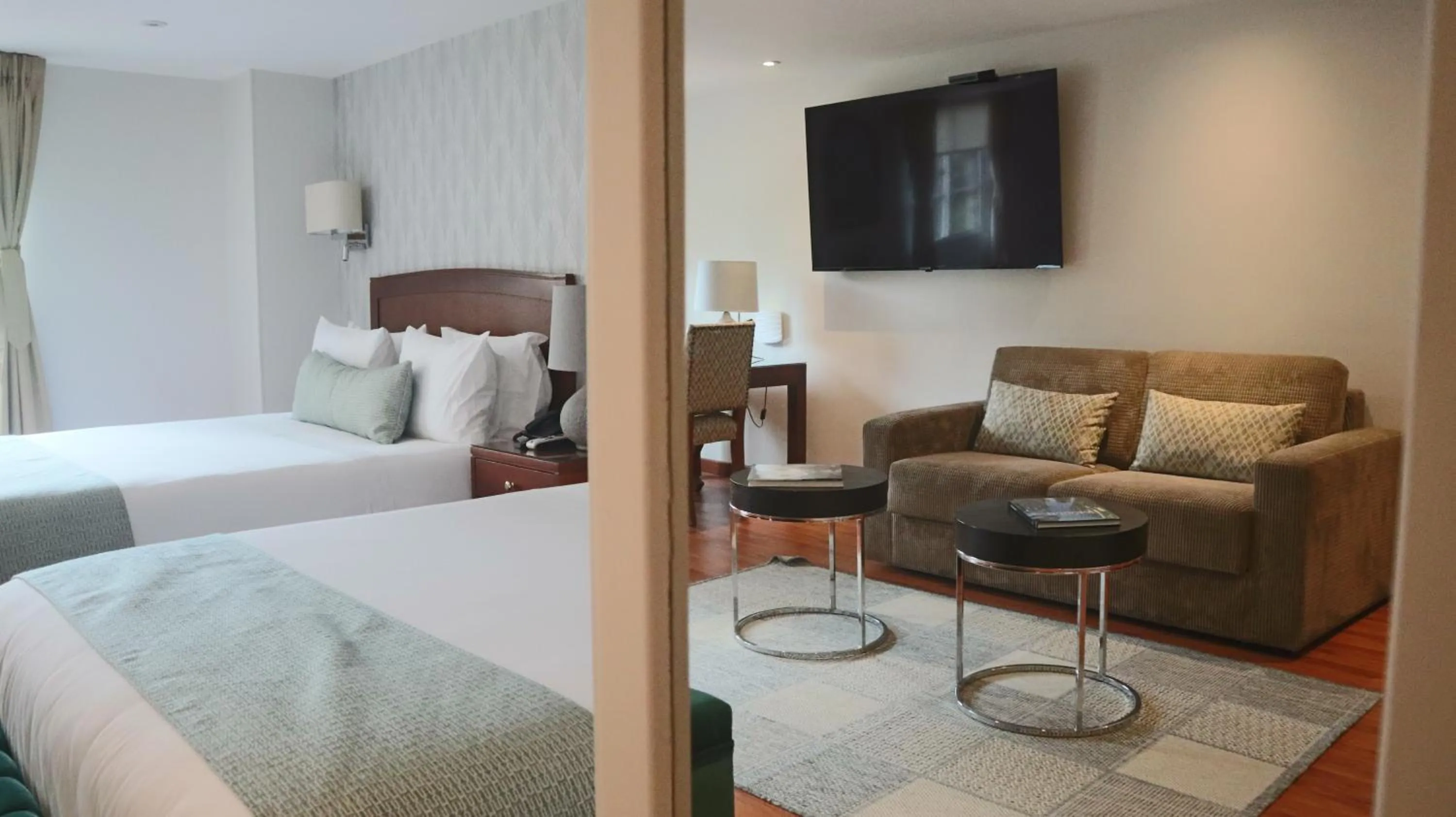 Living room, Bed in Hotel Portón de la Cabrera