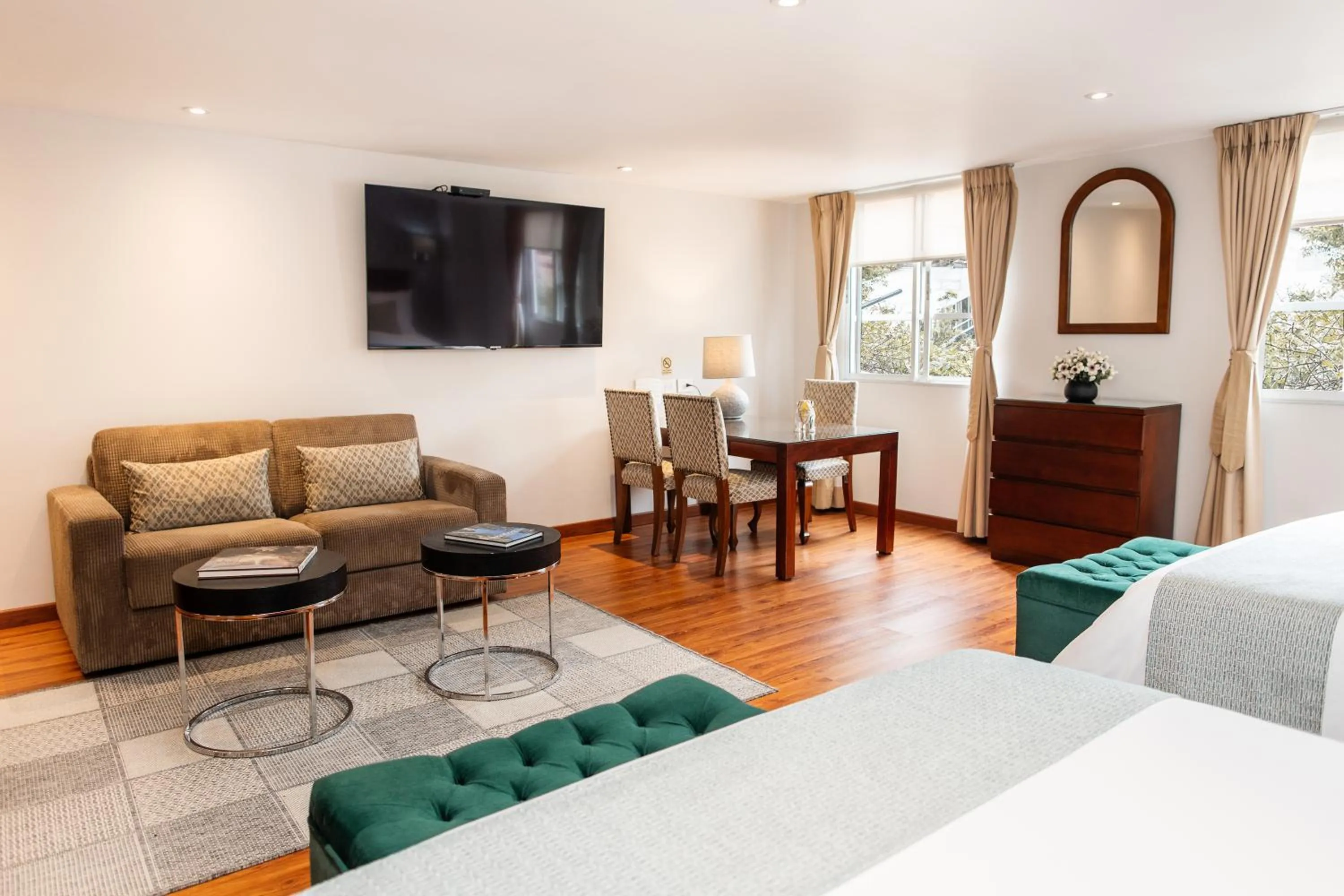 Living room, Bed in Hotel Portón de la Cabrera