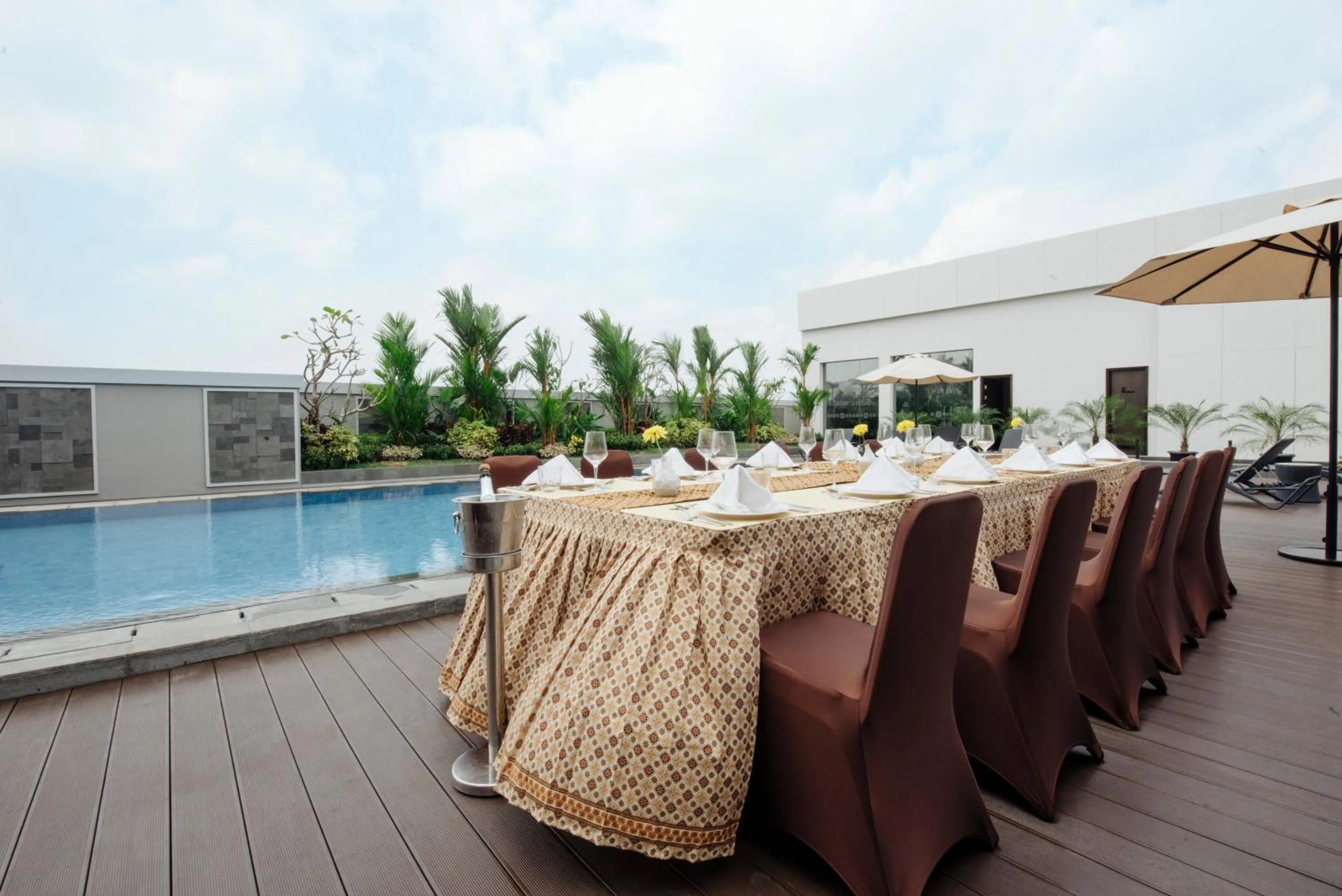 Swimming pool in GRAMM HOTEL by Ambarrukmo Yogyakarta