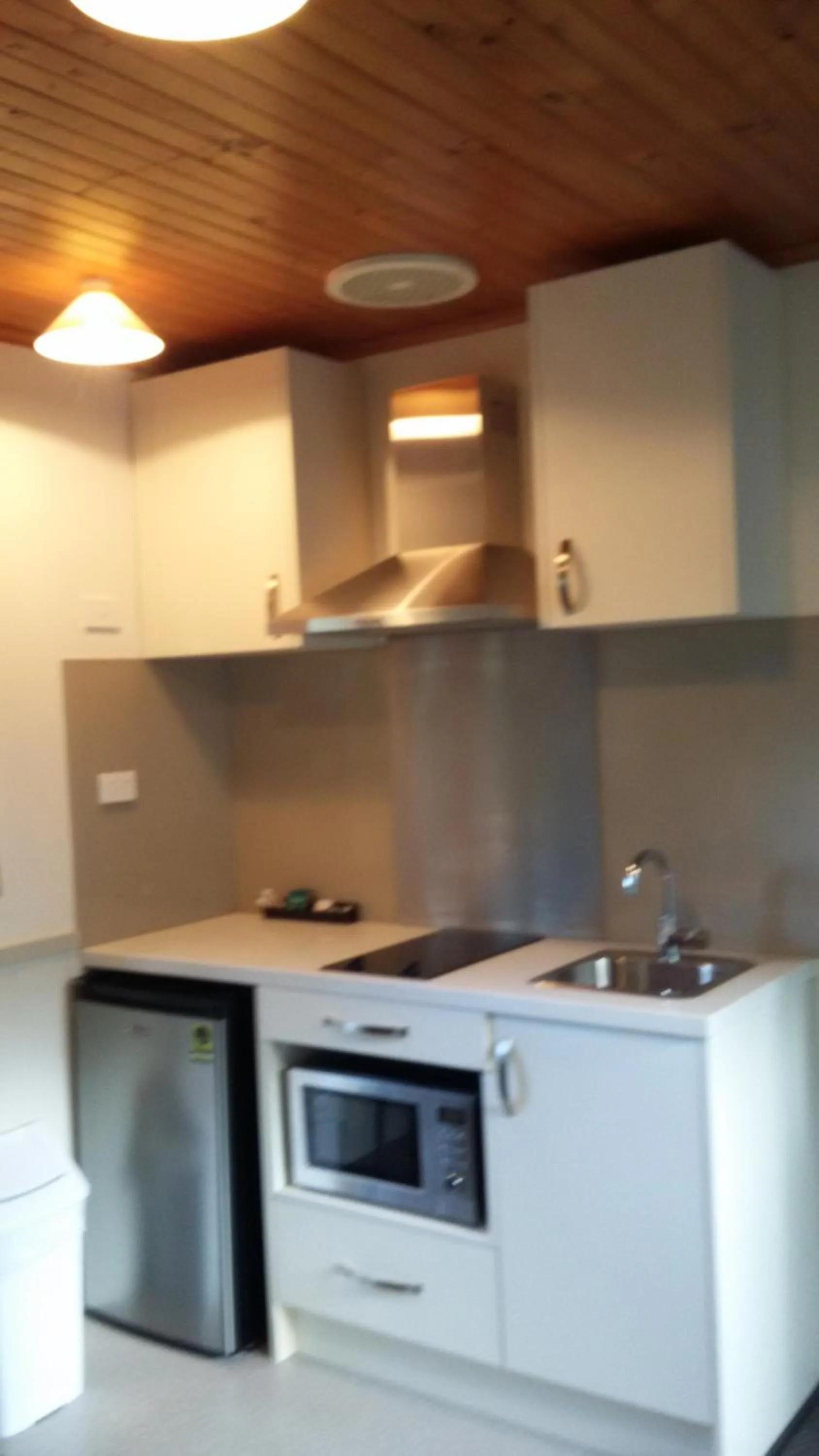 Kitchen or kitchenette in Strahan Retreat Holiday Park
