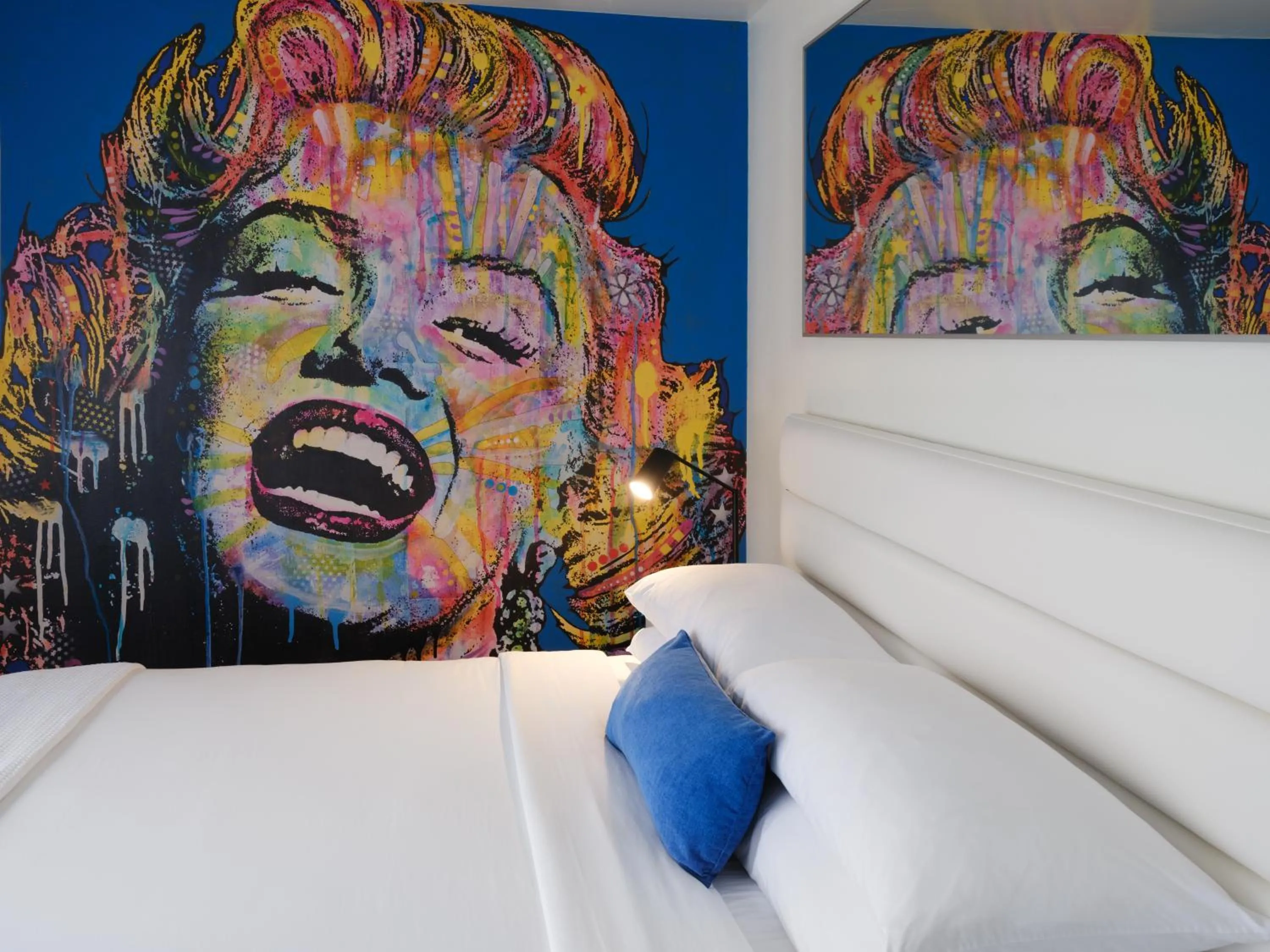 Bed in Jupiter Hotel