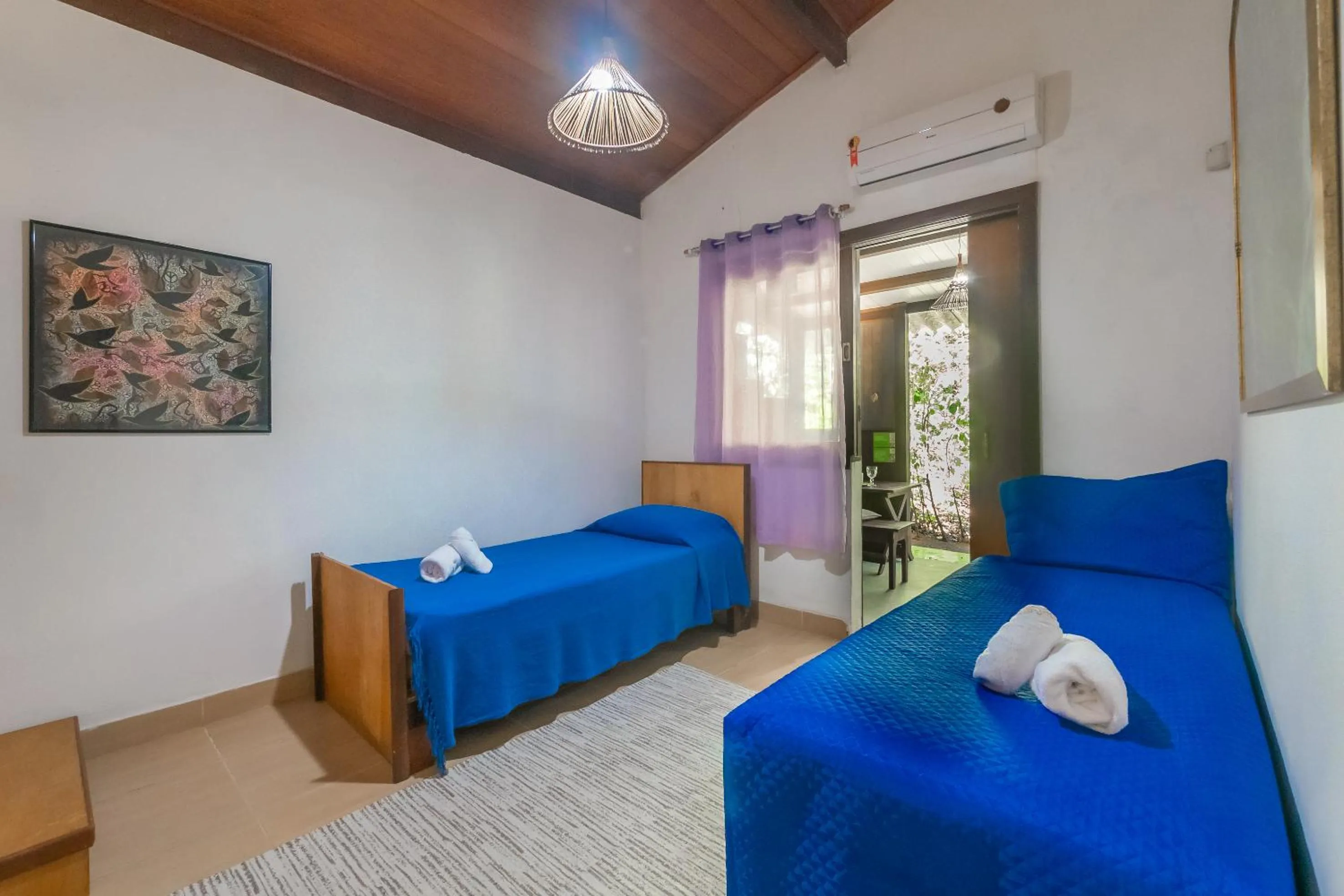 Bed in Recanto dos Pássaros Zen Apartamentos em meio de Natureza