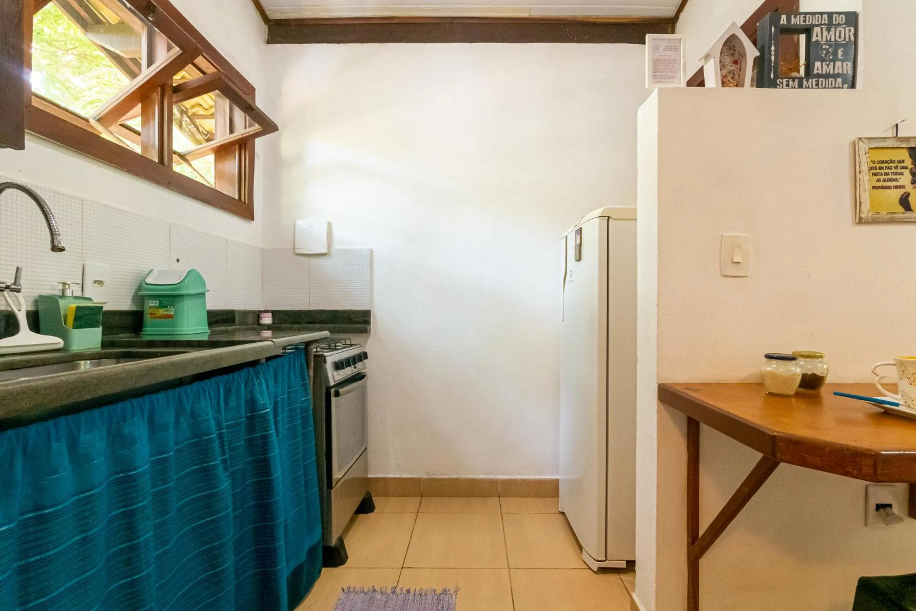 Kitchen or kitchenette in Recanto dos Pássaros Zen Apartamentos em meio de Natureza