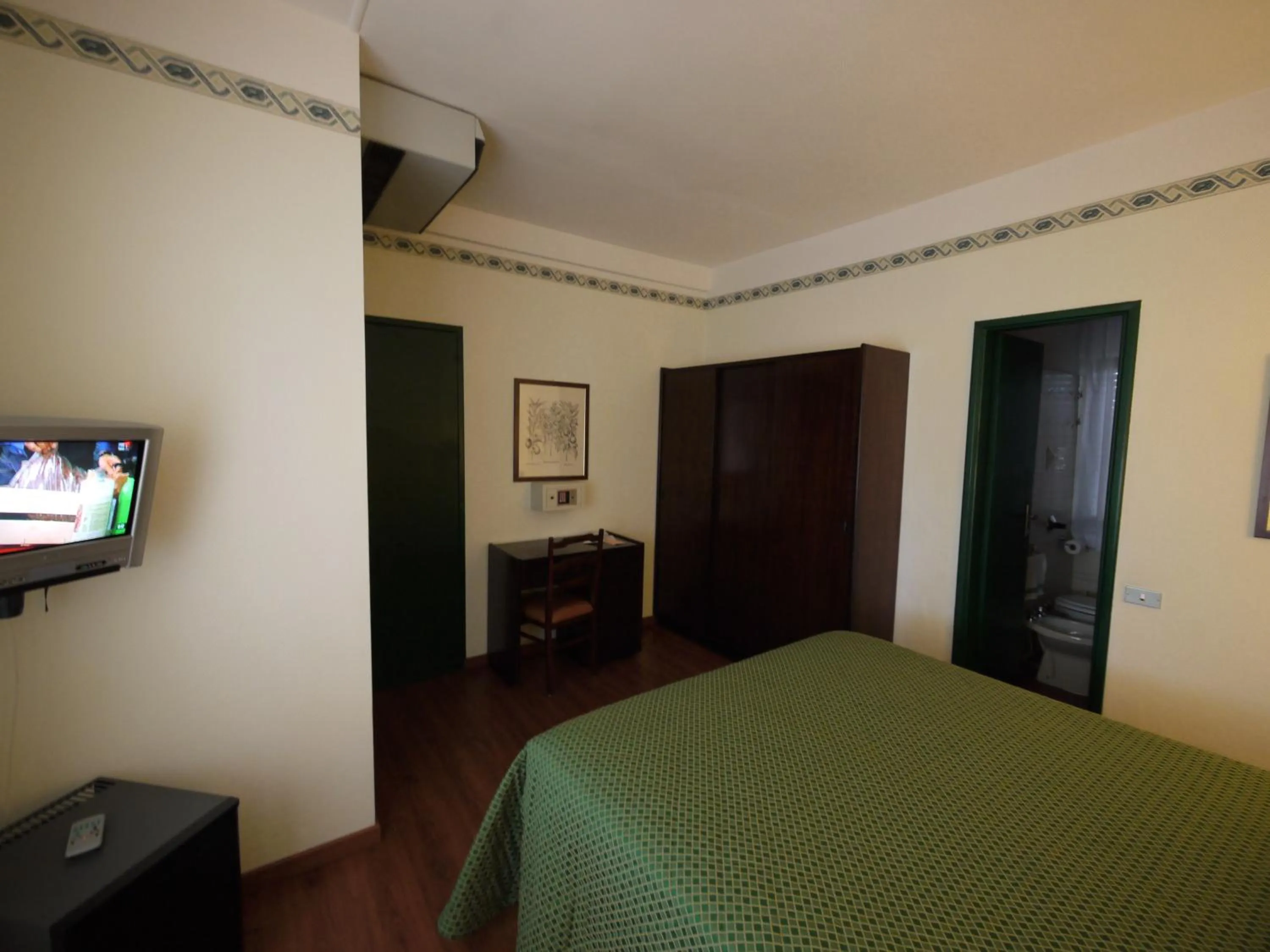 Bed in Hotel Piccadilly