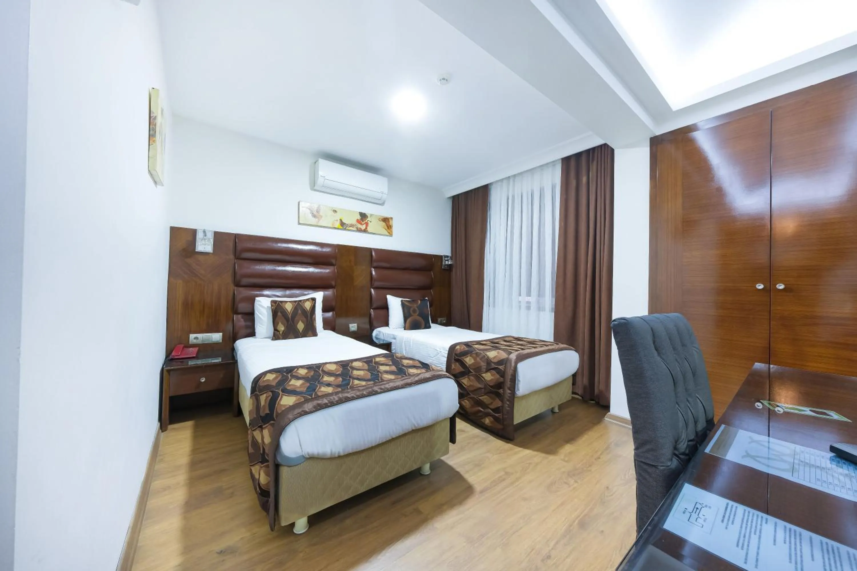 Bed in Marlight Boutique Hotel