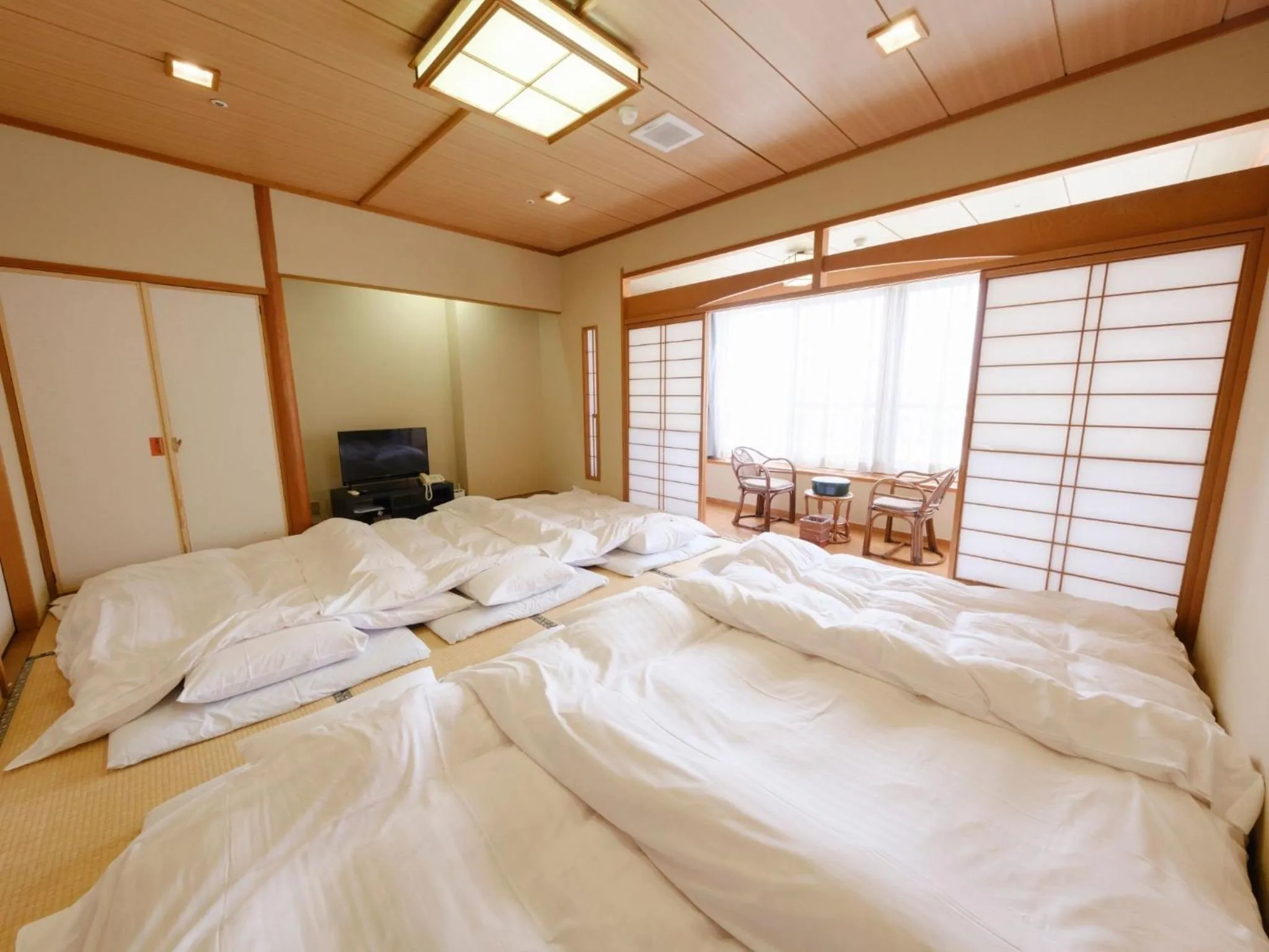 Photo of the whole room, Bed in Sagayamato Onsen Hotel Amandi