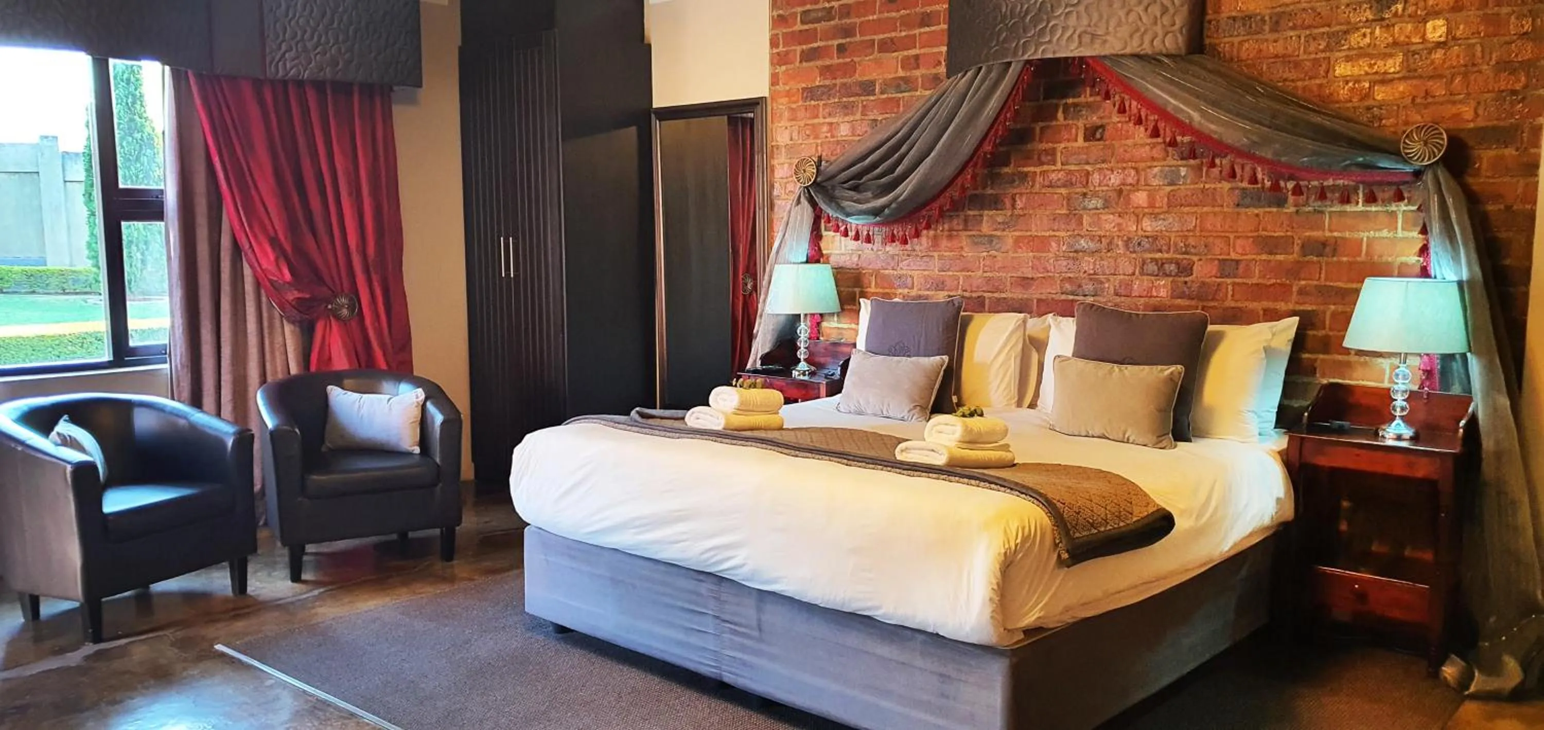 Bedroom, Bed in Accolades Boutique Venue