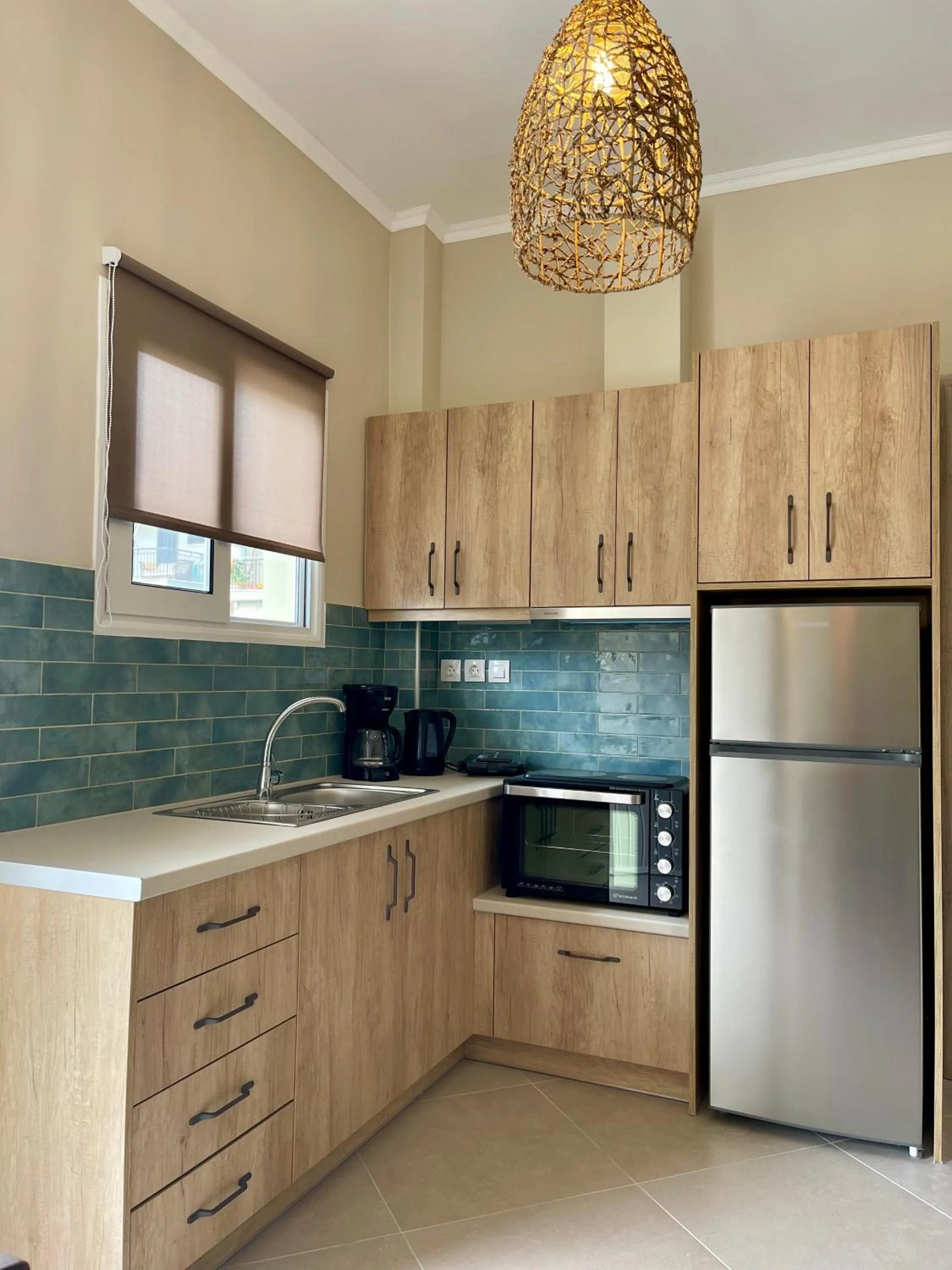 Kitchen or kitchenette in Helen Hotel