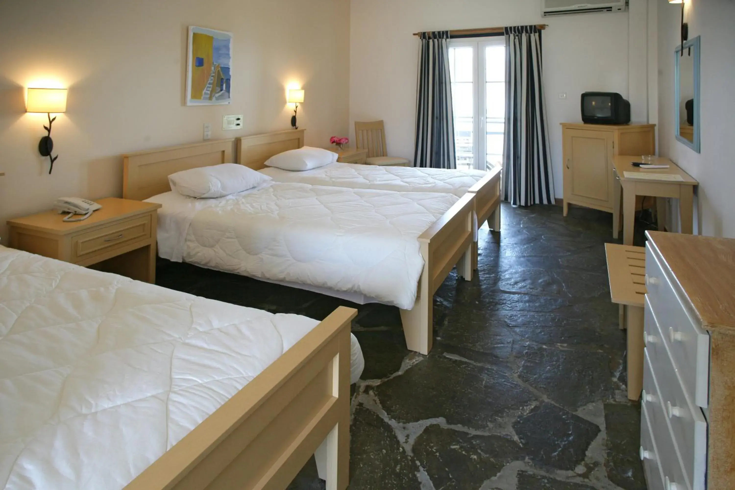 Triple Room with Sea View in Andros Holiday Hotel Triple Room with Sea View in Andros Holiday Hotel